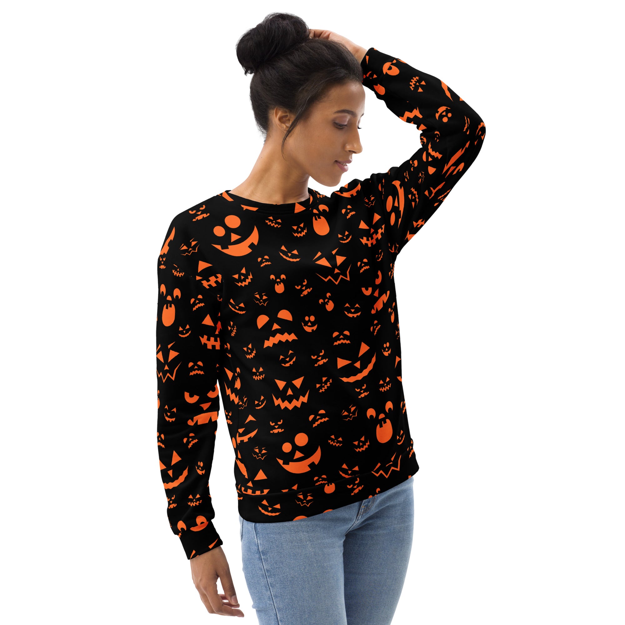 Black long-sleeved sweatshirt with orange jack-o-lantern faces and brushed inner fleece for Halloween wear