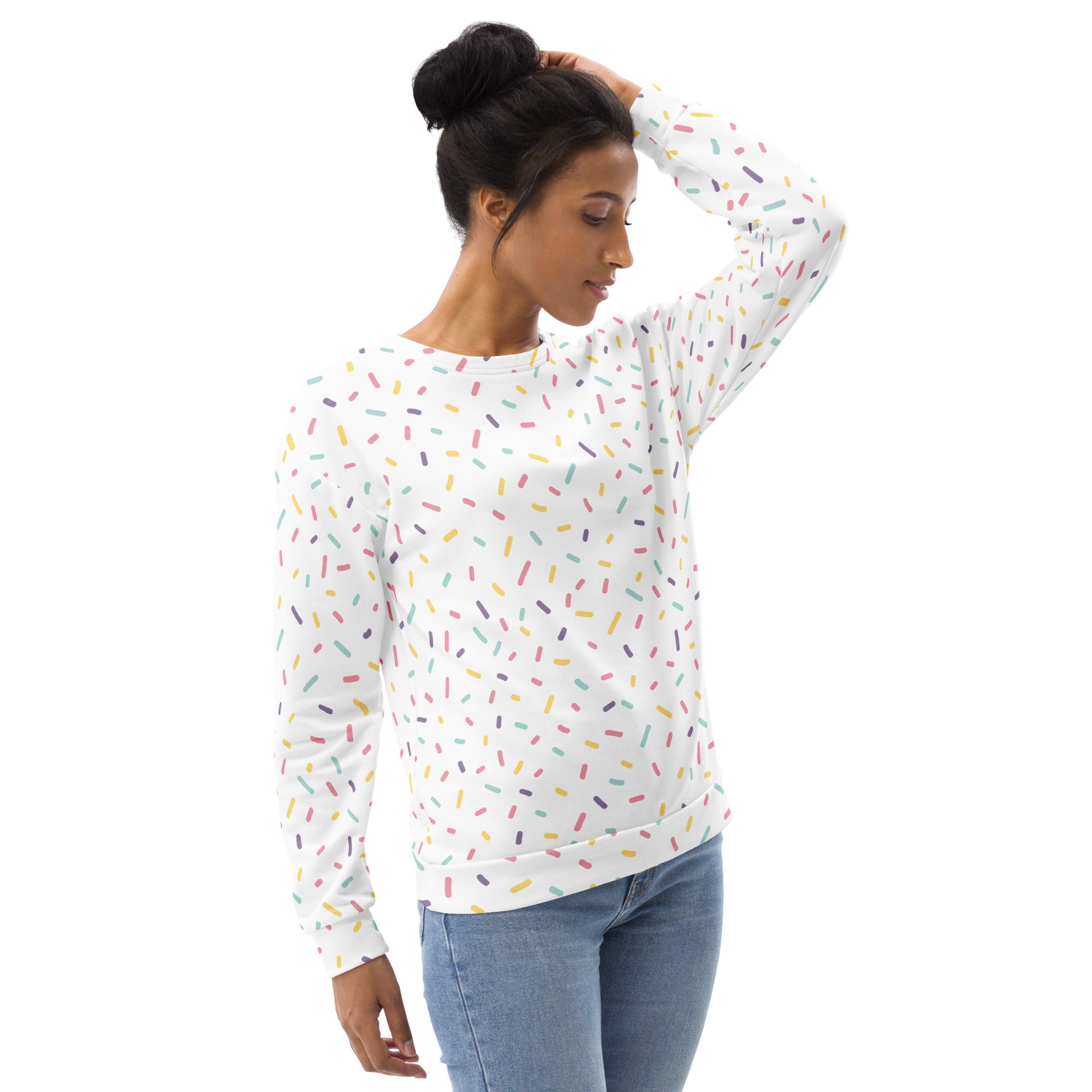 White long-sleeved sweatshirt with multicolored sprinkle pattern and brushed inner fleece fabric for warmth