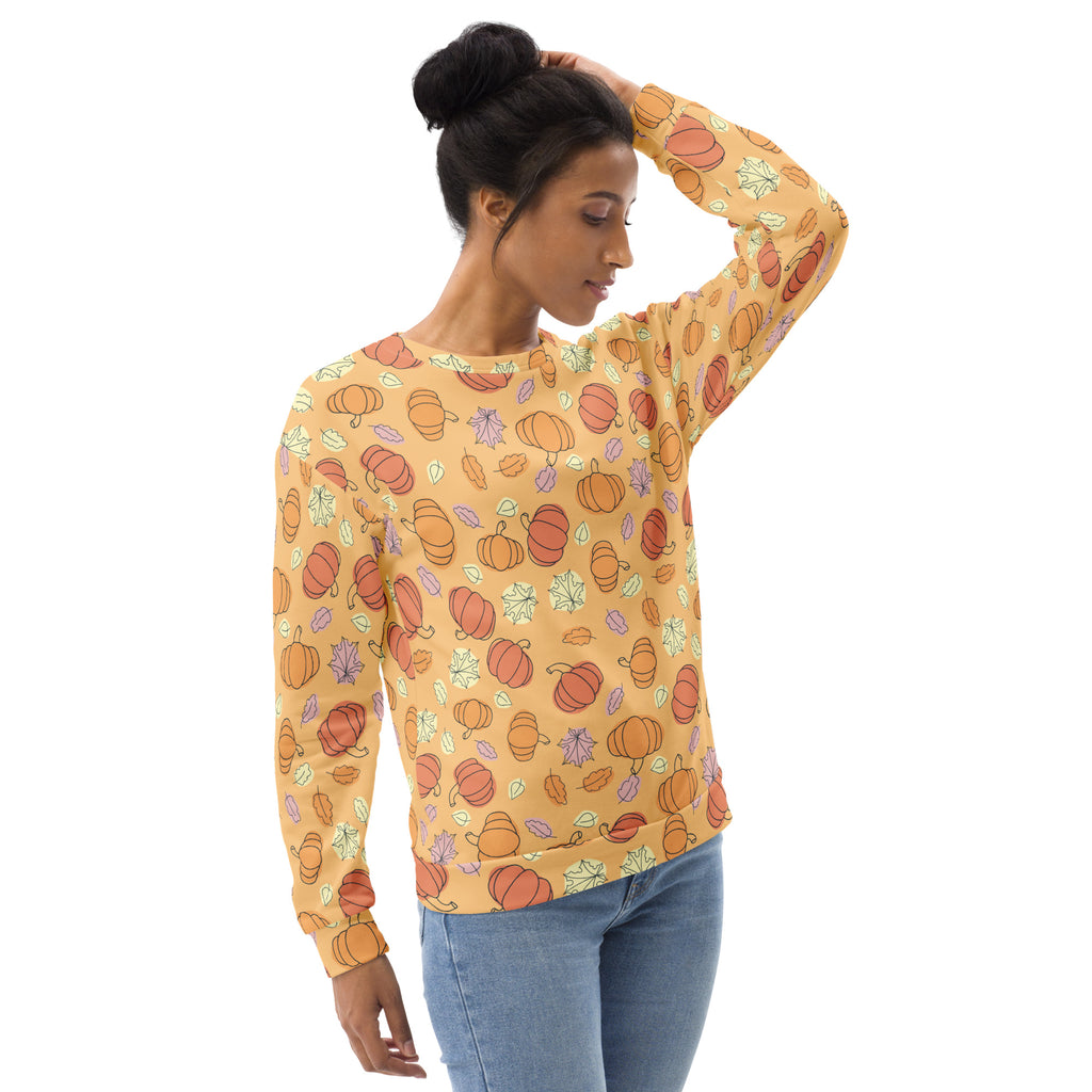 A mustard-yellow long-sleeved pumpkin patch sweatshirt with brushed inner fleece and autumn leaf pattern