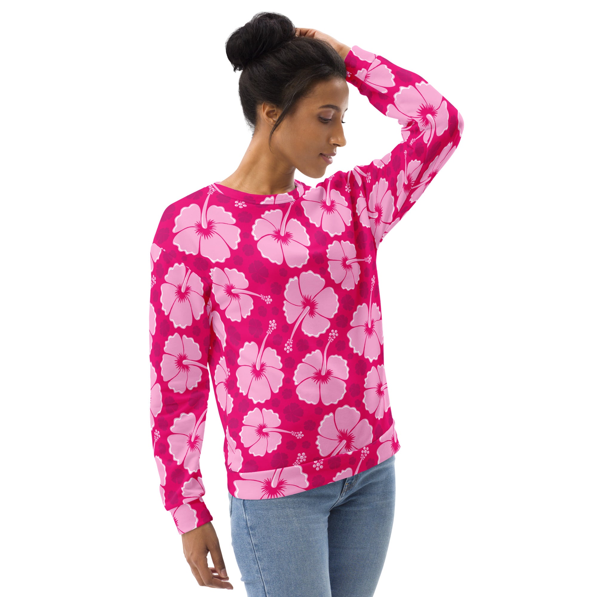 A vibrant pink long-sleeved tropical pink hibiscus sweatshirt with light pink flower pattern and brushed inner fleece fabric