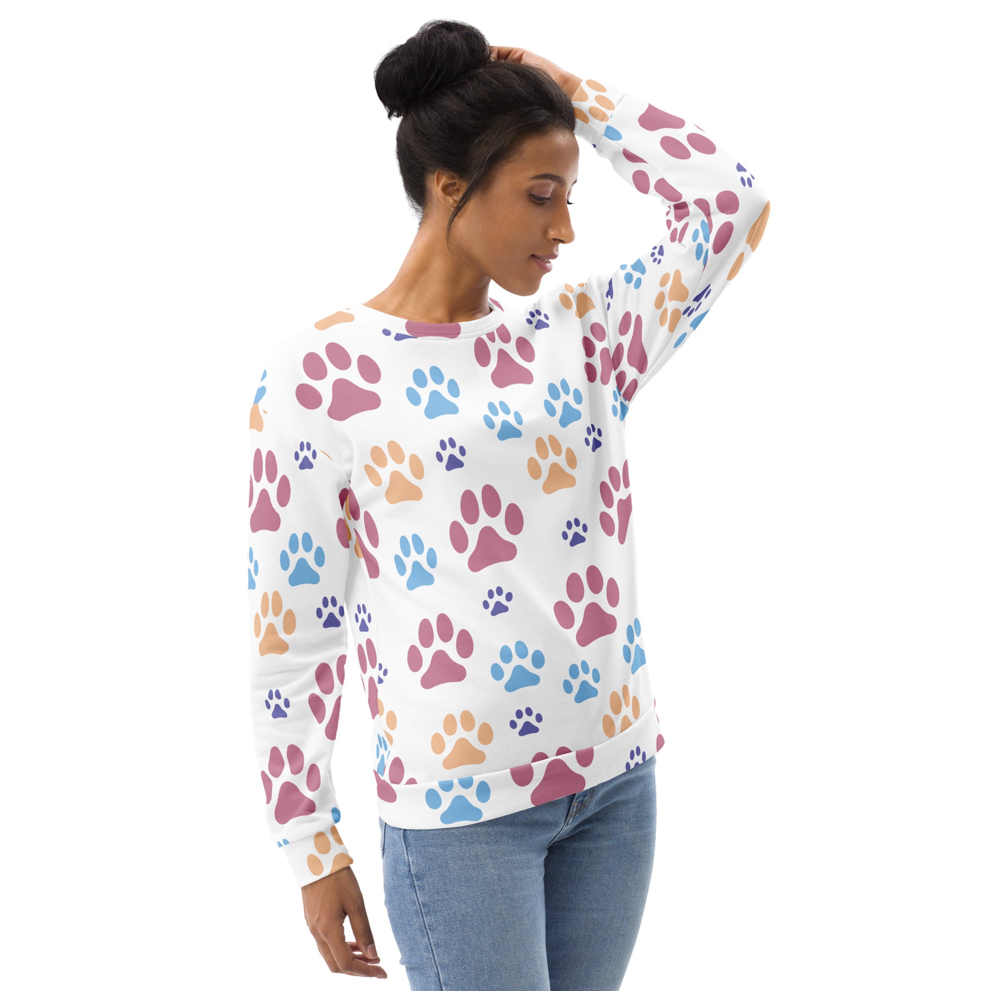 White long-sleeved sweatshirt with colorful paw print pattern and brushed inner fleece fabric for warmth