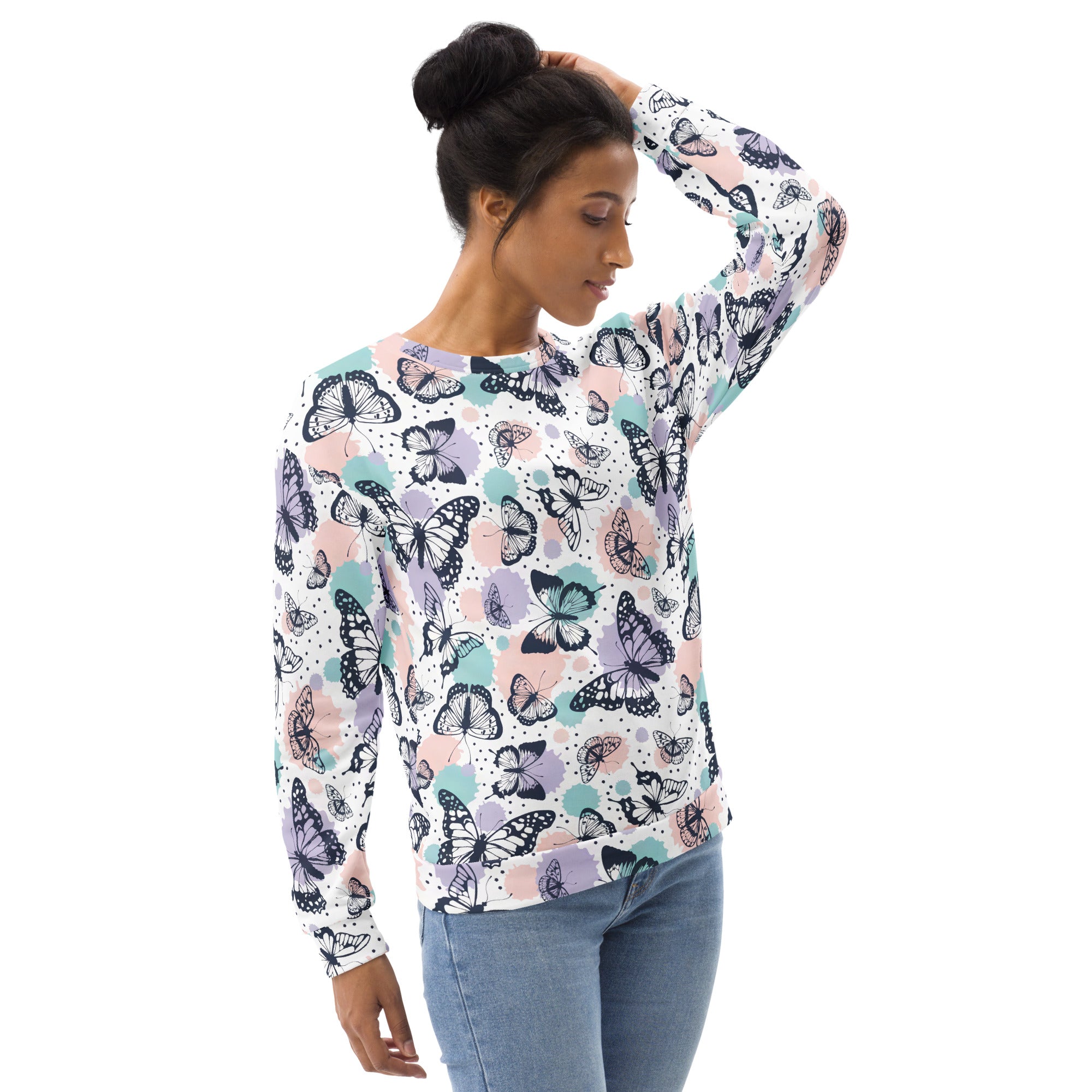 A soft long-sleeved butterfly sweatshirt with brushed inner fleece fabric in black pink and mint green on white background