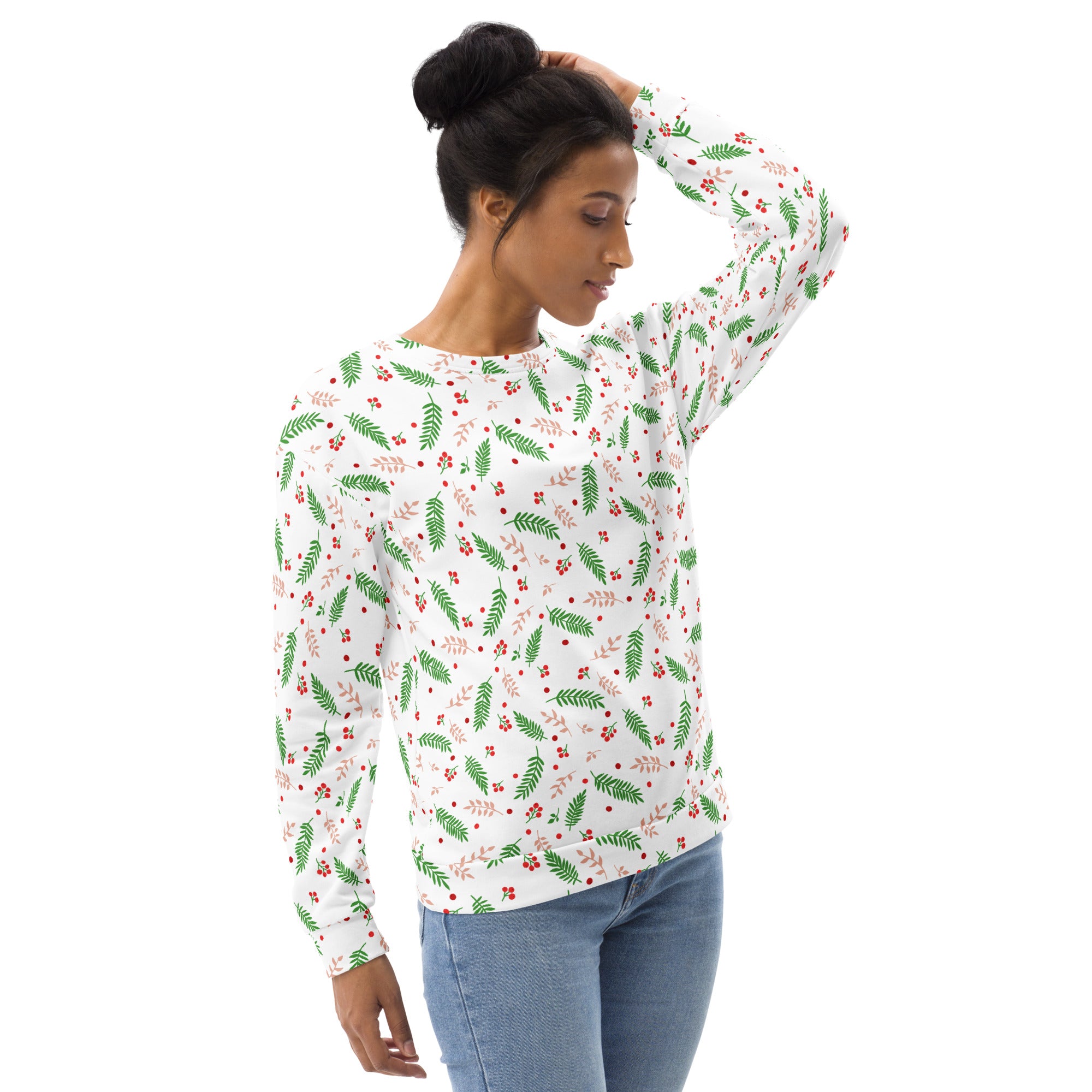 White long-sleeved holly berry Christmas sweatshirt with green fern and red berry pattern and brushed inner fleece fabric