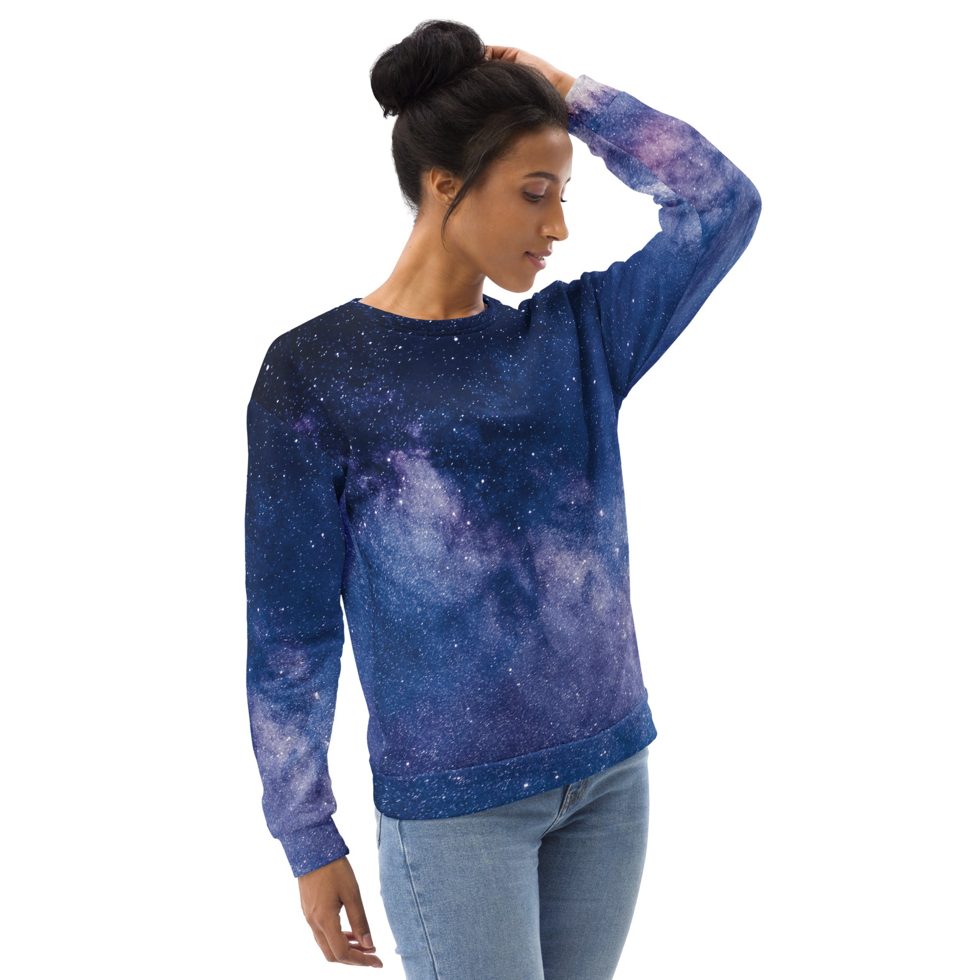 A women’s long-sleeved sweatshirt with a realistic galaxy print in deep blues and purples with brushed fleece lining