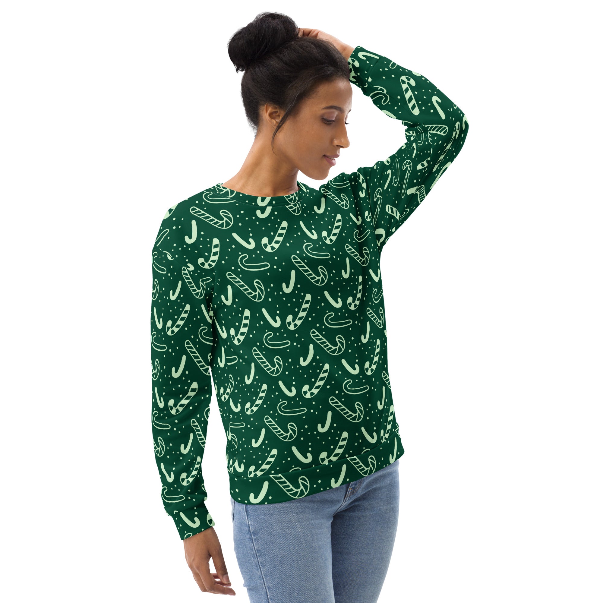 Green long-sleeved candy cane sweatshirt with brushed inner fleece fabric featuring white candy cane pattern