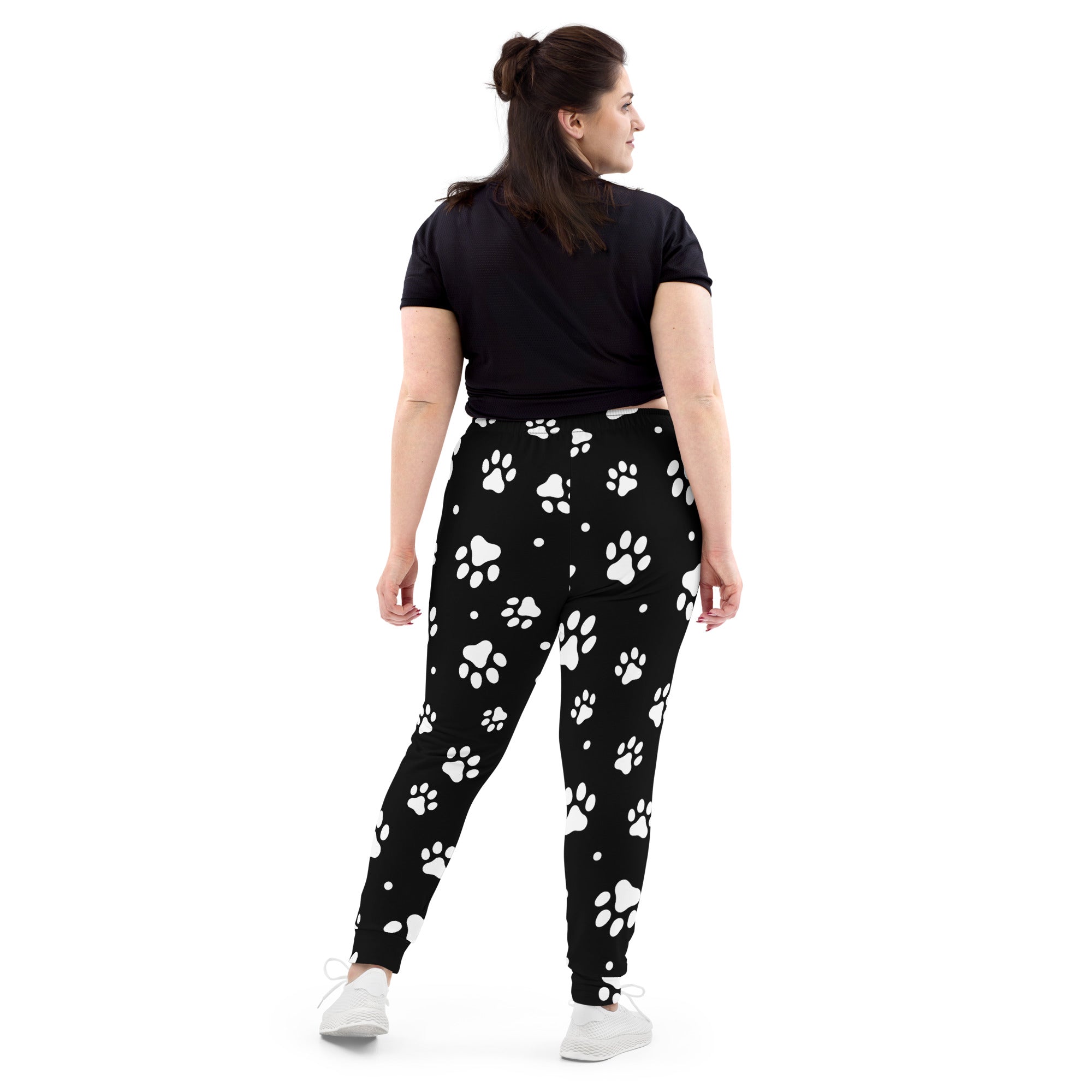 Black women’s jogger pants with white paw print pattern cozy brushed inside fleece and pockets