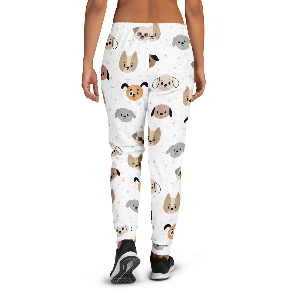 White women’s jogger pants with playful multicolor cartoon dog faces made of cozy recycled fleece with pockets