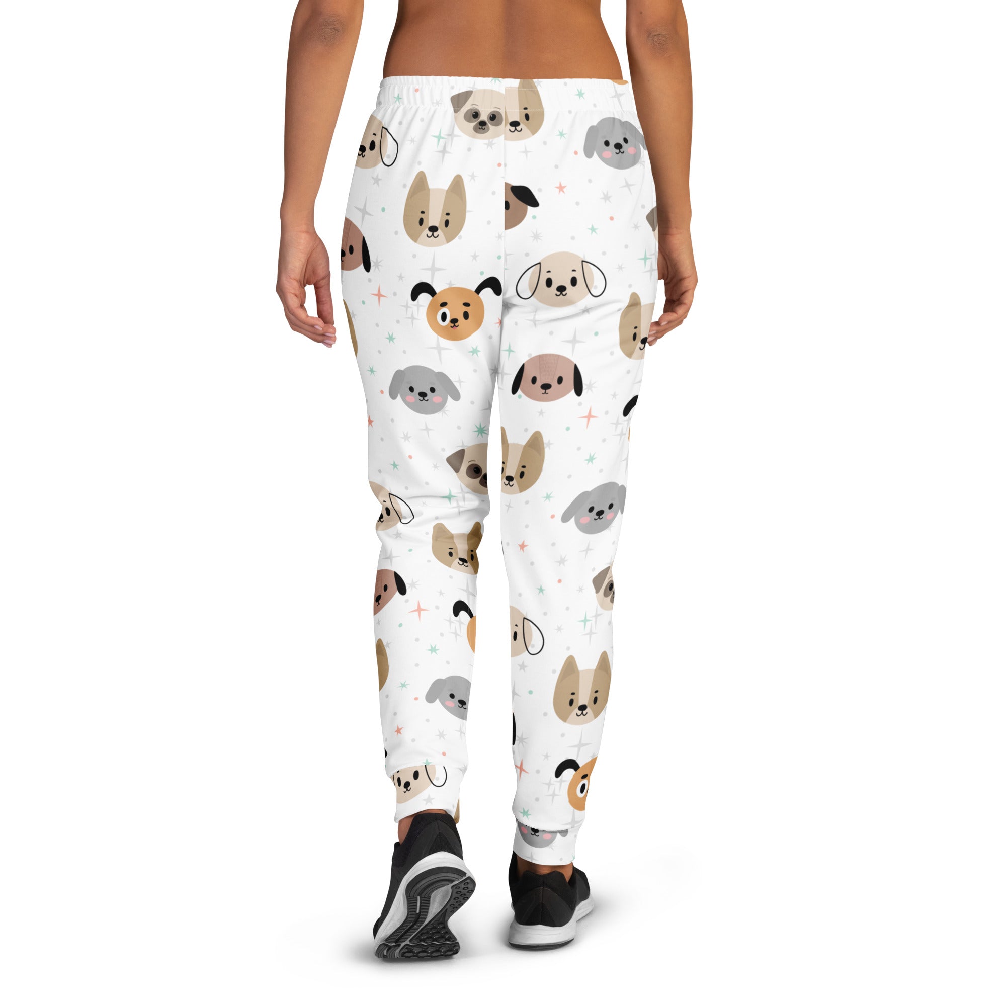 White women’s jogger pants with playful multicolor cartoon dog faces made of cozy recycled fleece with pockets