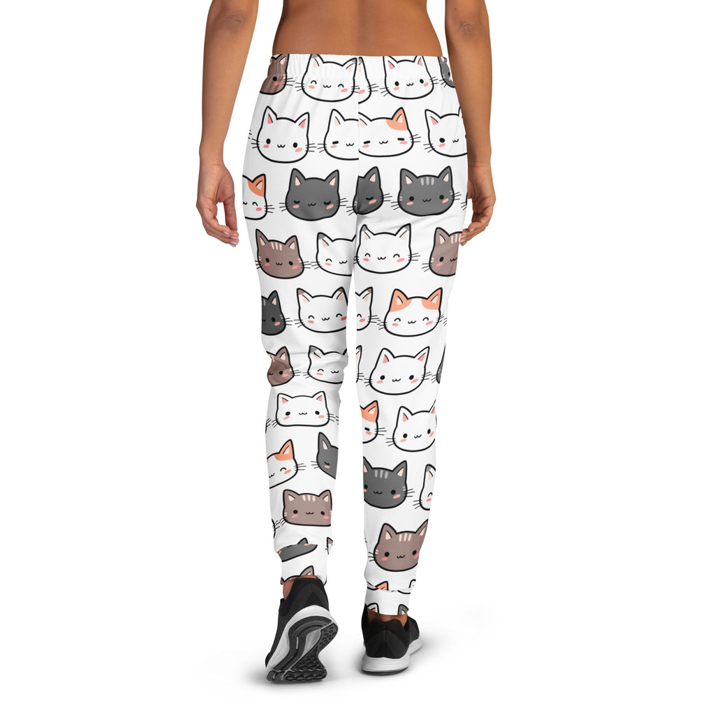 White women’s recycled jogger pants with cozy brushed fleece inside and colorful cartoon cat face pattern