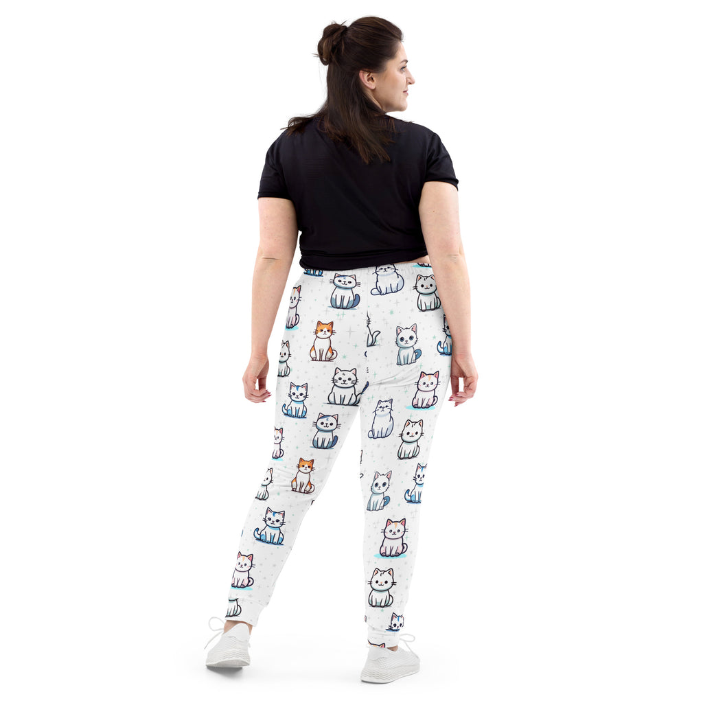 Women’s white pajama jogger pants with cozy brushed fleece and colorful cartoon cat pattern and pockets