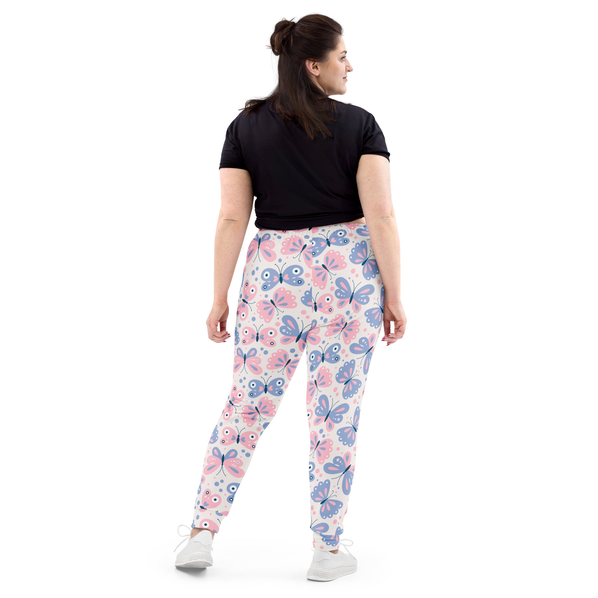 Women’s butterfly recycled jogger pants with cozy brushed fleece inside featuring pink and blue butterfly patterns