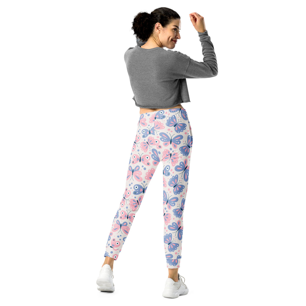 Women’s butterfly recycled jogger pants with pink and blue butterfly pattern white base cozy brushed fleece lining