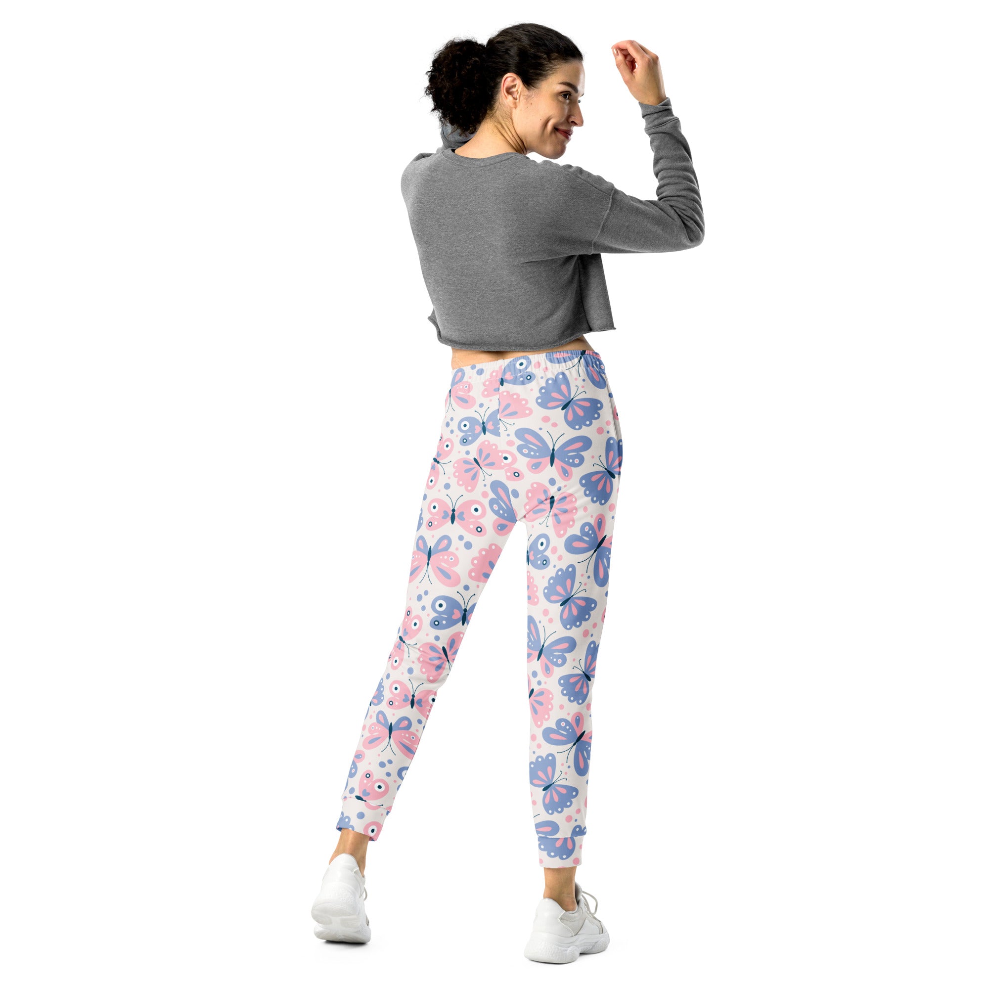Women’s butterfly recycled jogger pants with pink and blue butterfly pattern white base cozy brushed fleece lining