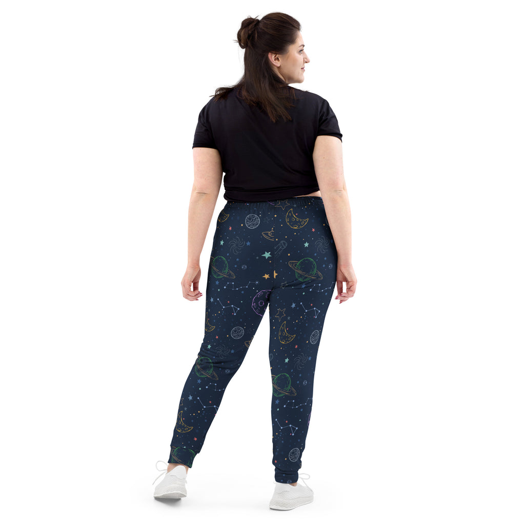 Women’s dark blue space-themed jogger pants with embroidered pastel planets stars constellations cozy fleece