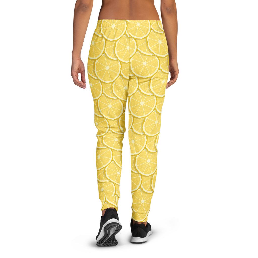 Women’s lemon slice jogger pants with pockets in yellow pattern made from cozy recycled brushed inside fleece