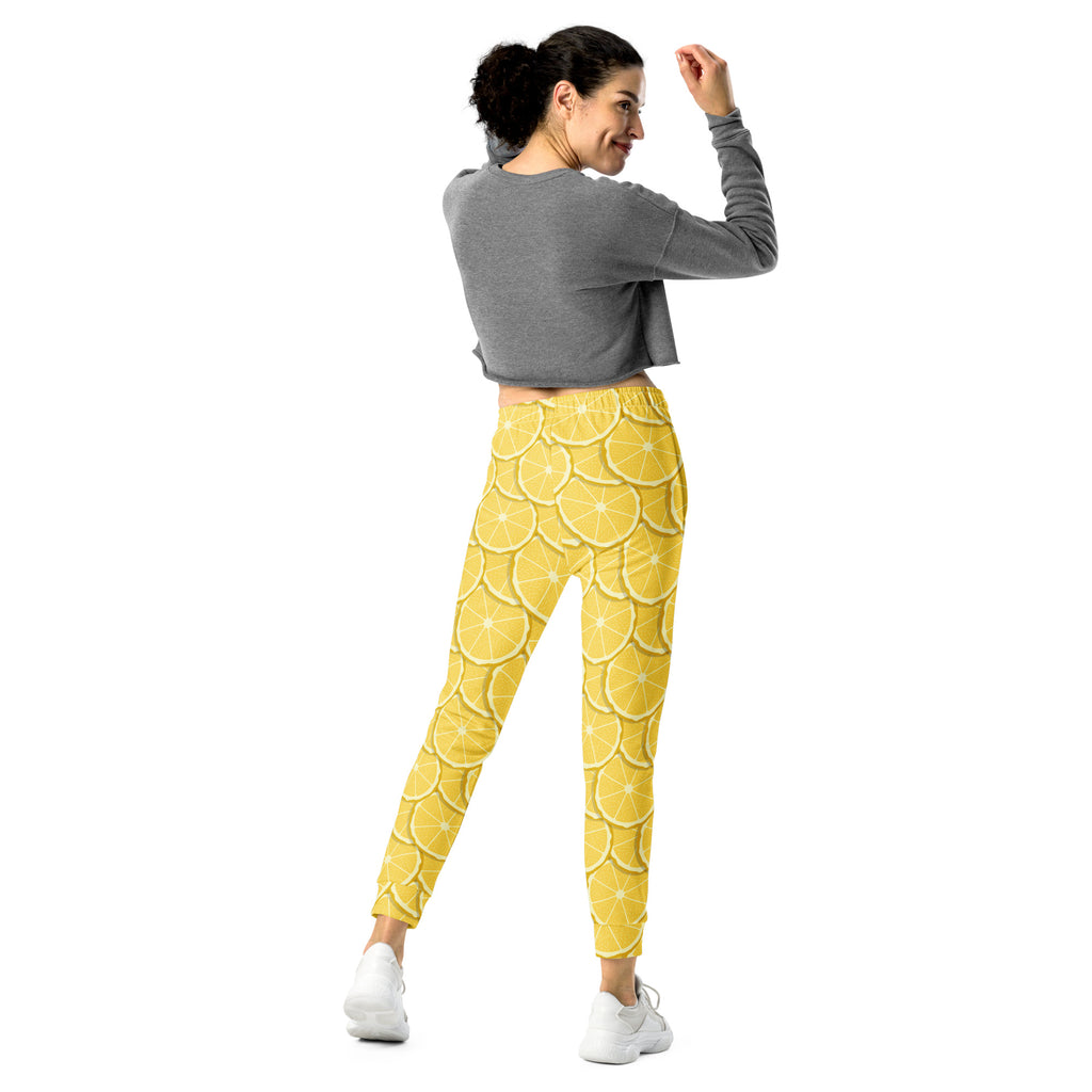 Women’s lemon slice recycled jogger pants with pockets in yellow patterned fleece for cozy comfort