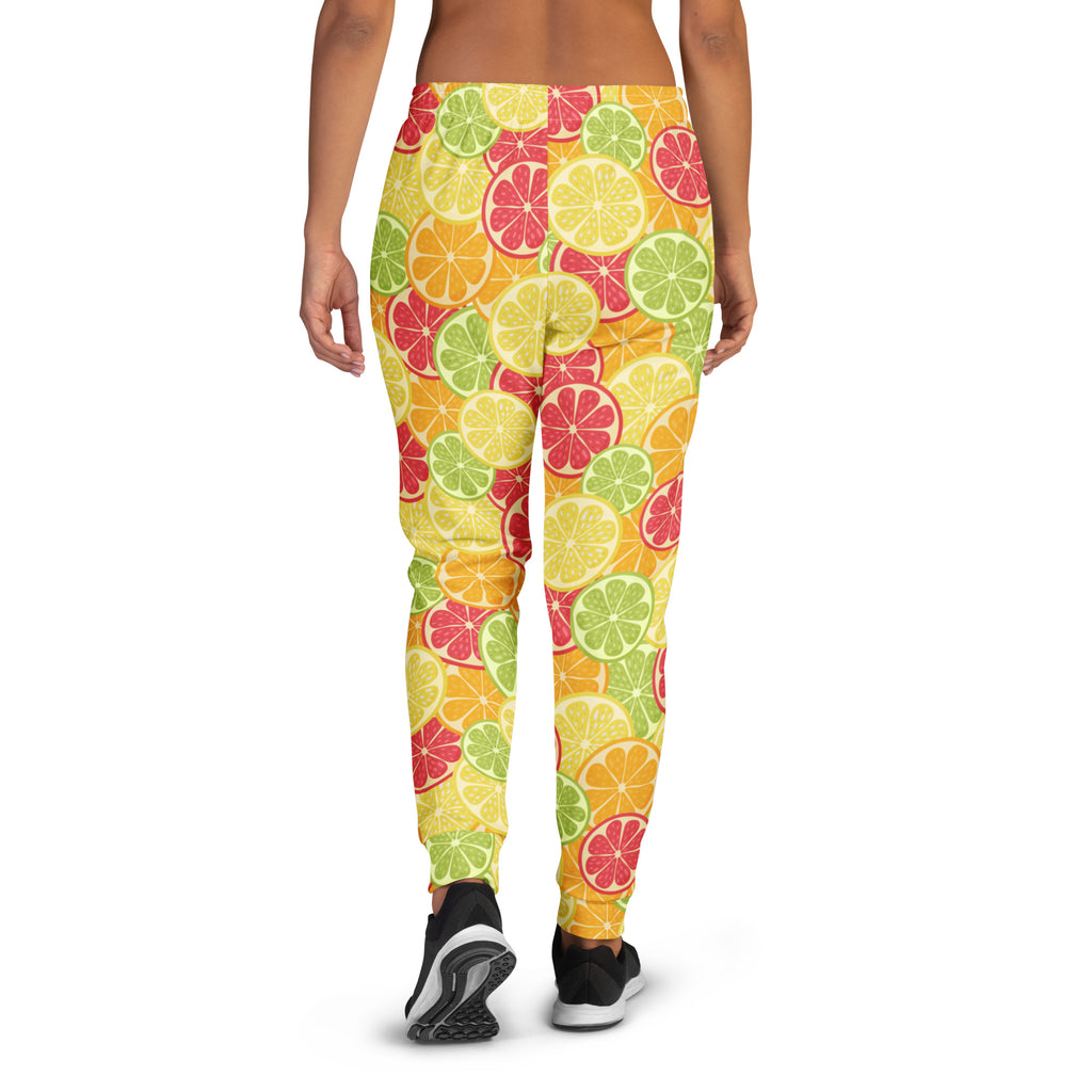 Women’s citrus slice recycled jogger pants with pockets in yellow green and pink with cozy brushed inside fleece