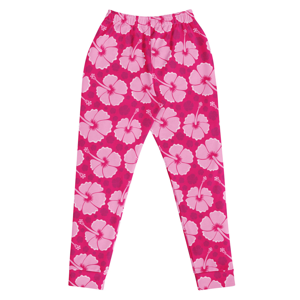 Women’s pink hibiscus floral recycled jogger pants with pockets featuring a vibrant magenta base and cozy fleece lining