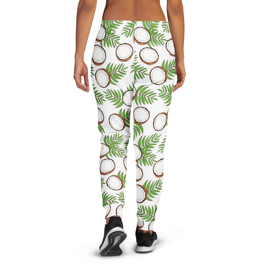 White womens jogger pants with vibrant coconut and palm leaf print cozy brushed inside fleece with pockets
