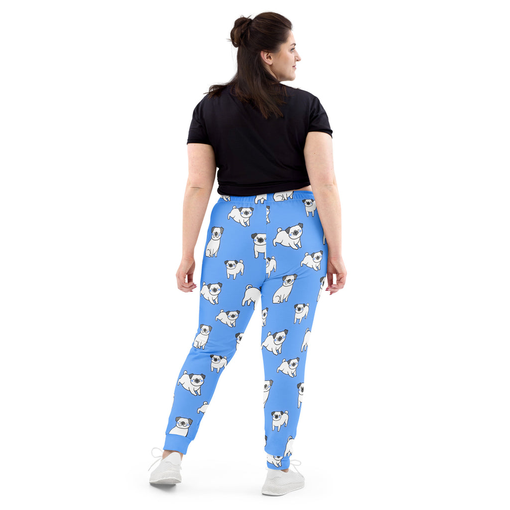 Women’s blue jogger pants with a playful white pug pattern made from recycled cozy brushed fleece with pockets