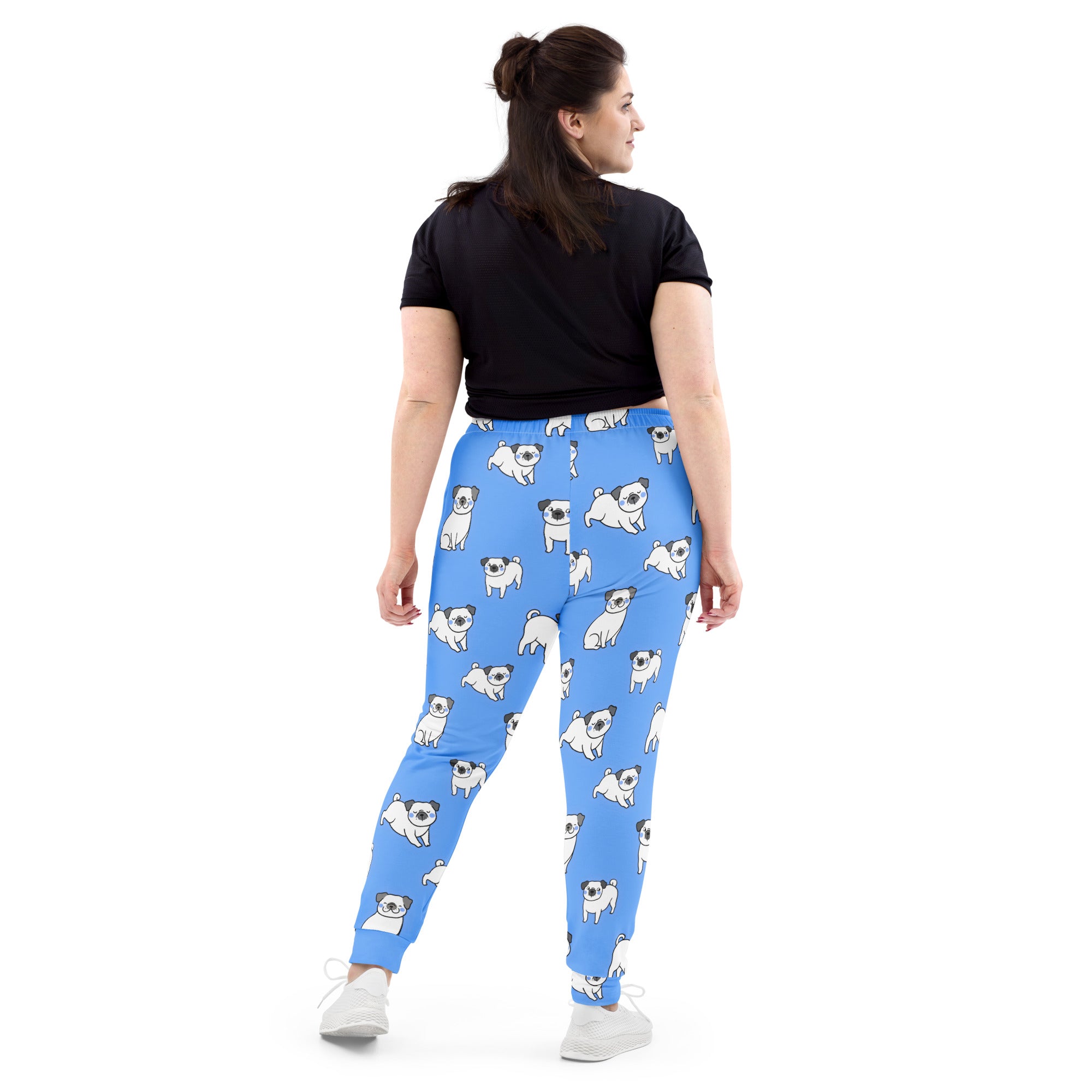 Women’s blue jogger pants with a playful white pug pattern made from recycled cozy brushed fleece with pockets