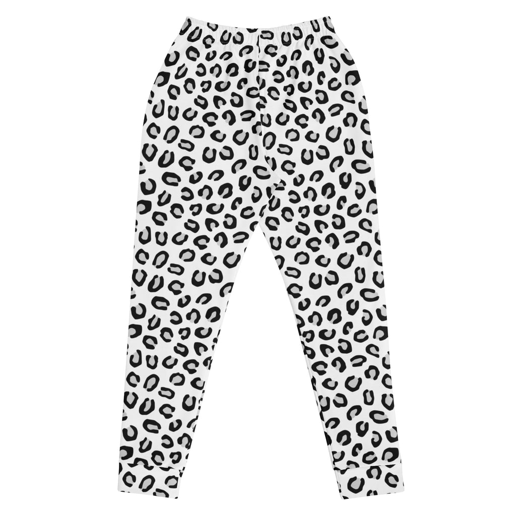 White leggings with bold black leopard print featuring cozy brushed inside fleece and functional pockets
