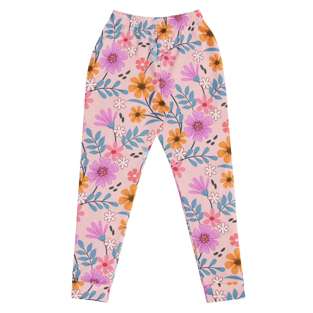 Women’s pink floral recycled jogger pants with pockets featuring vibrant purple orange and blue flowers on soft fleece