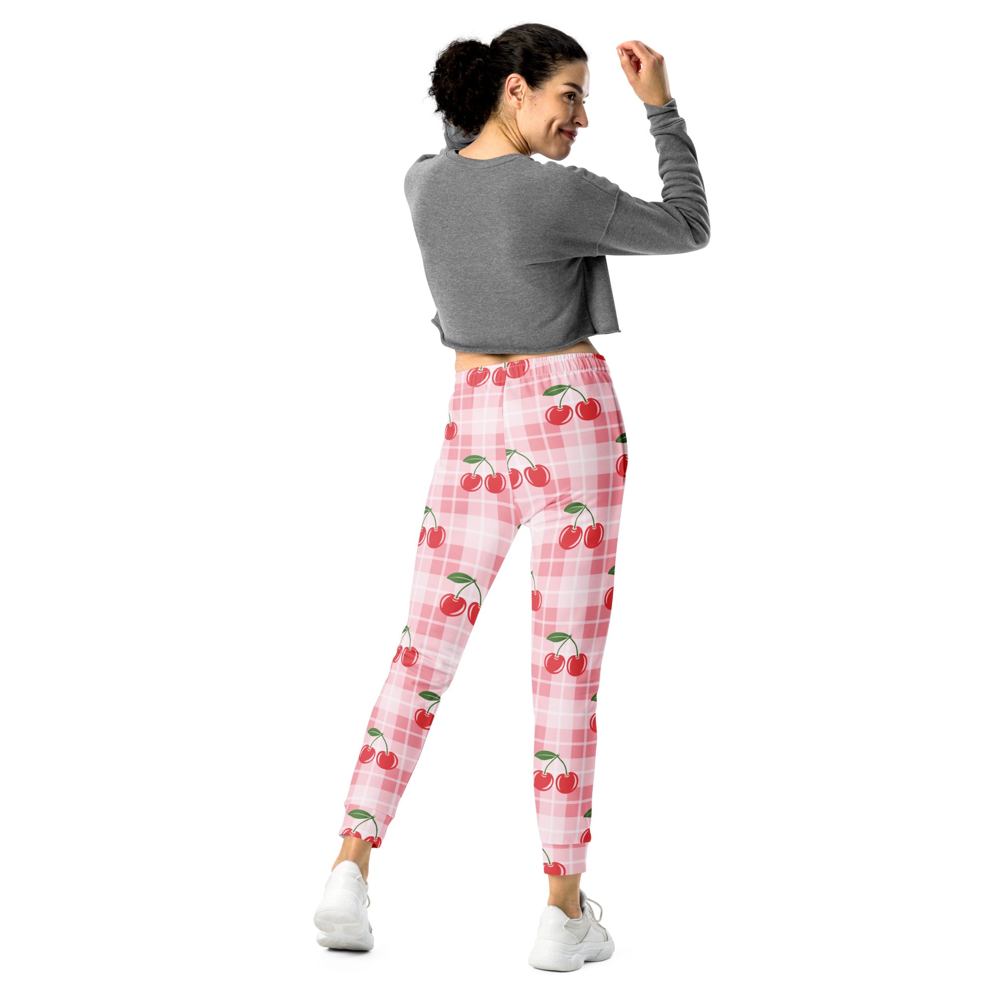 Women’s pink and white plaid jogger pants with red cherry pattern cozy recycled fleece with pockets
