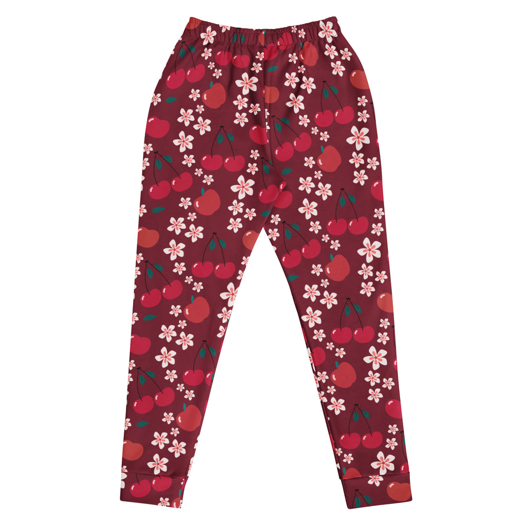 Women’s maroon cherry blossom jogger pants with pockets cozy brushed fleece inside featuring red cherries and pink blossoms