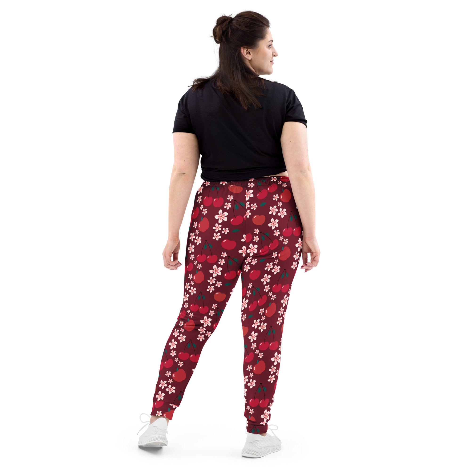 Women’s maroon cherry blossom recycled jogger pants with pockets featuring red cherries and pink blossoms cozy fleece interior