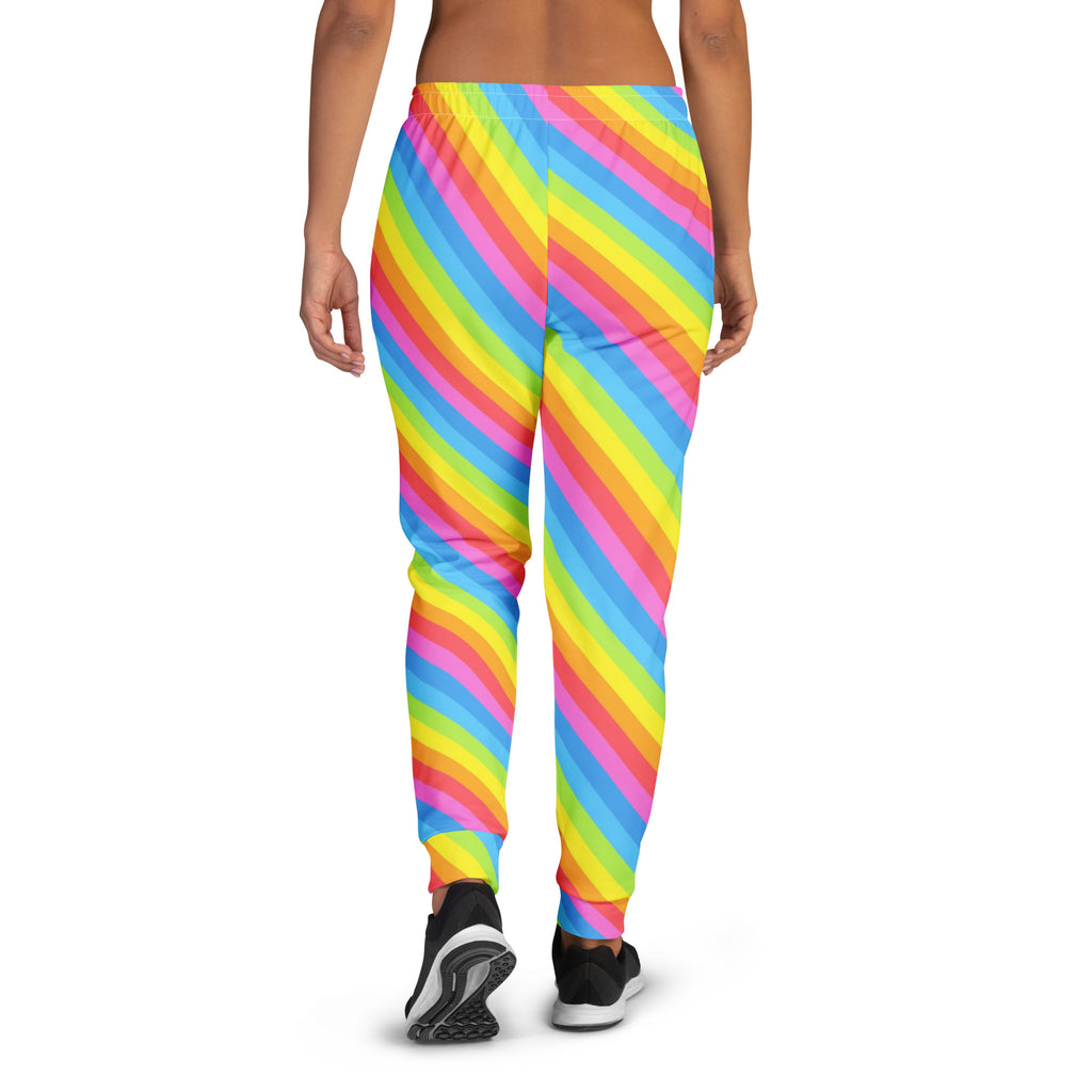 Women’s rainbow stripe recycled jogger pants with neon pink yellow and blue diagonal stripes and cozy brushed fleece lining