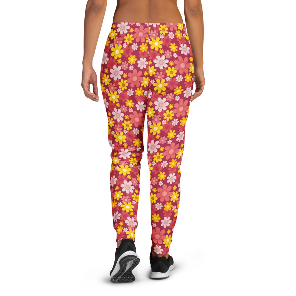 Women’s red floral recycled jogger pants with pink and yellow floral pattern cozy brushed fleece interior