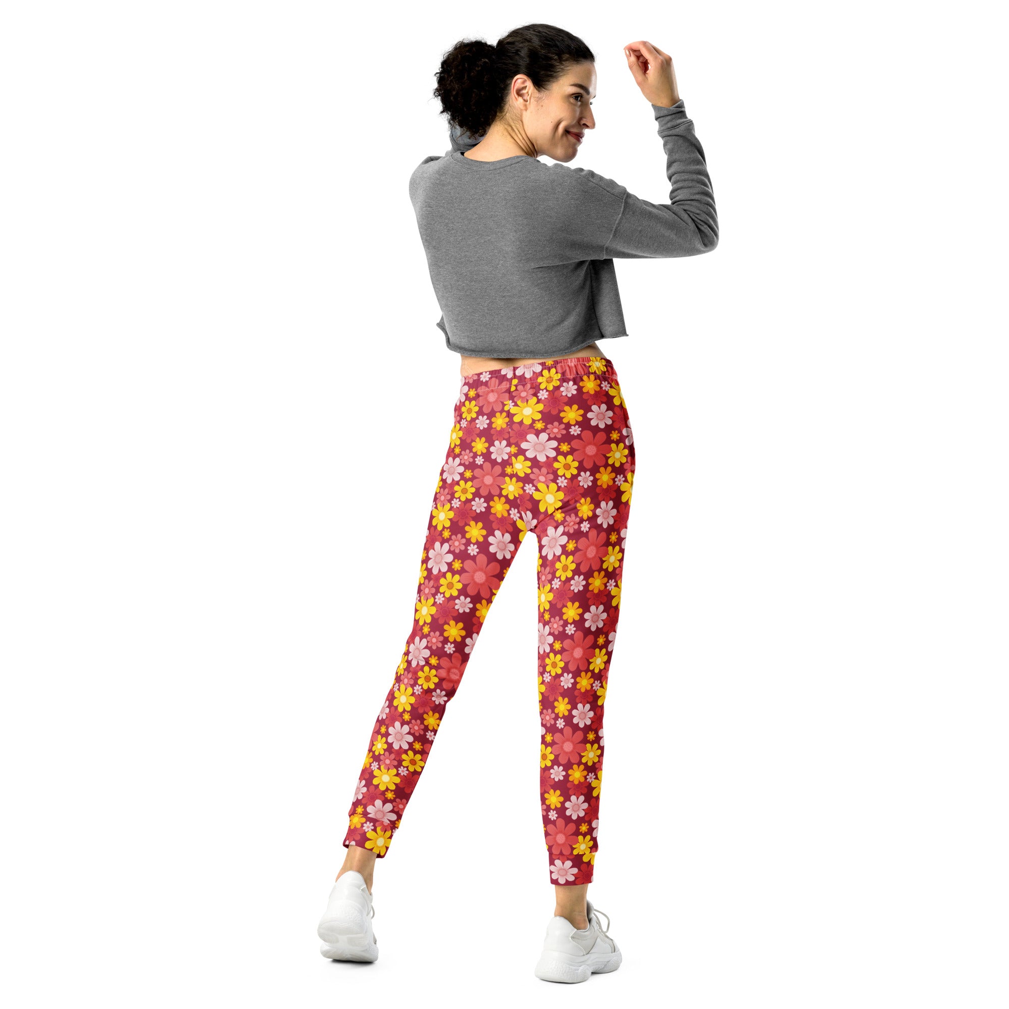 Women’s red floral recycled jogger pants with yellow and pink flowers cozy brushed inside fleece with pockets