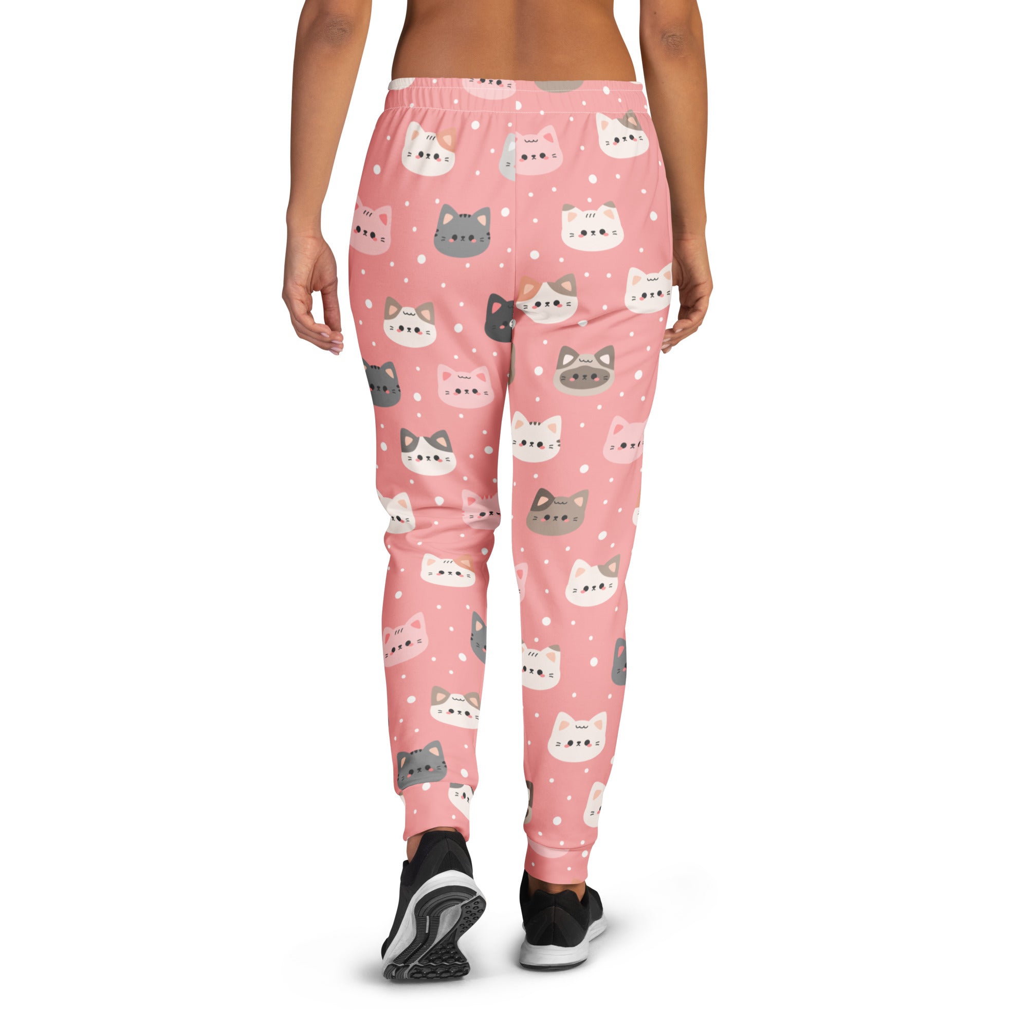 Women’s pink recycled jogger pants with cozy brushed inside fleece featuring white gray and pink cartoon cat faces and polka dots