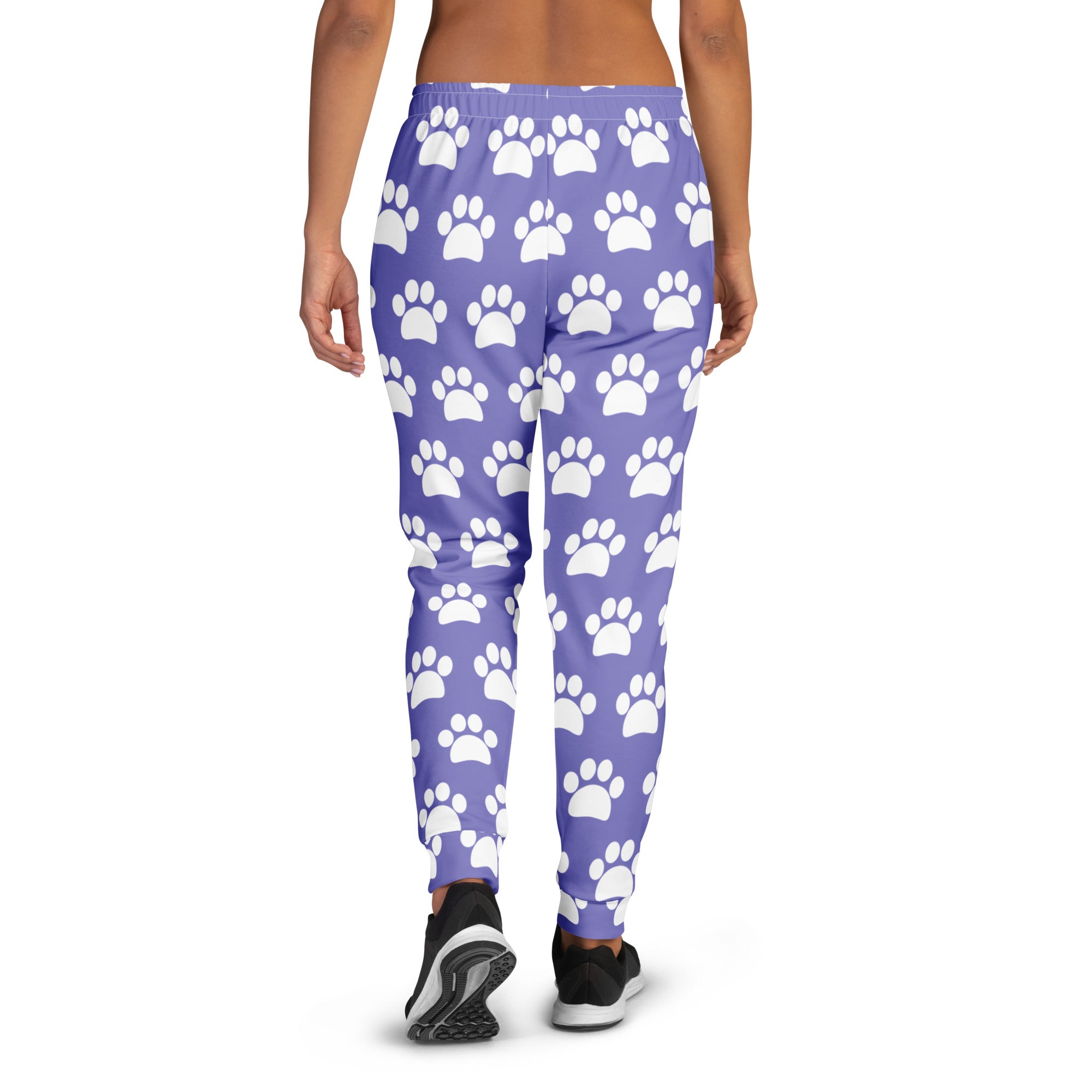 Women’s purple jogger pants with white paw print pattern cozy brushed inside fleece and pockets