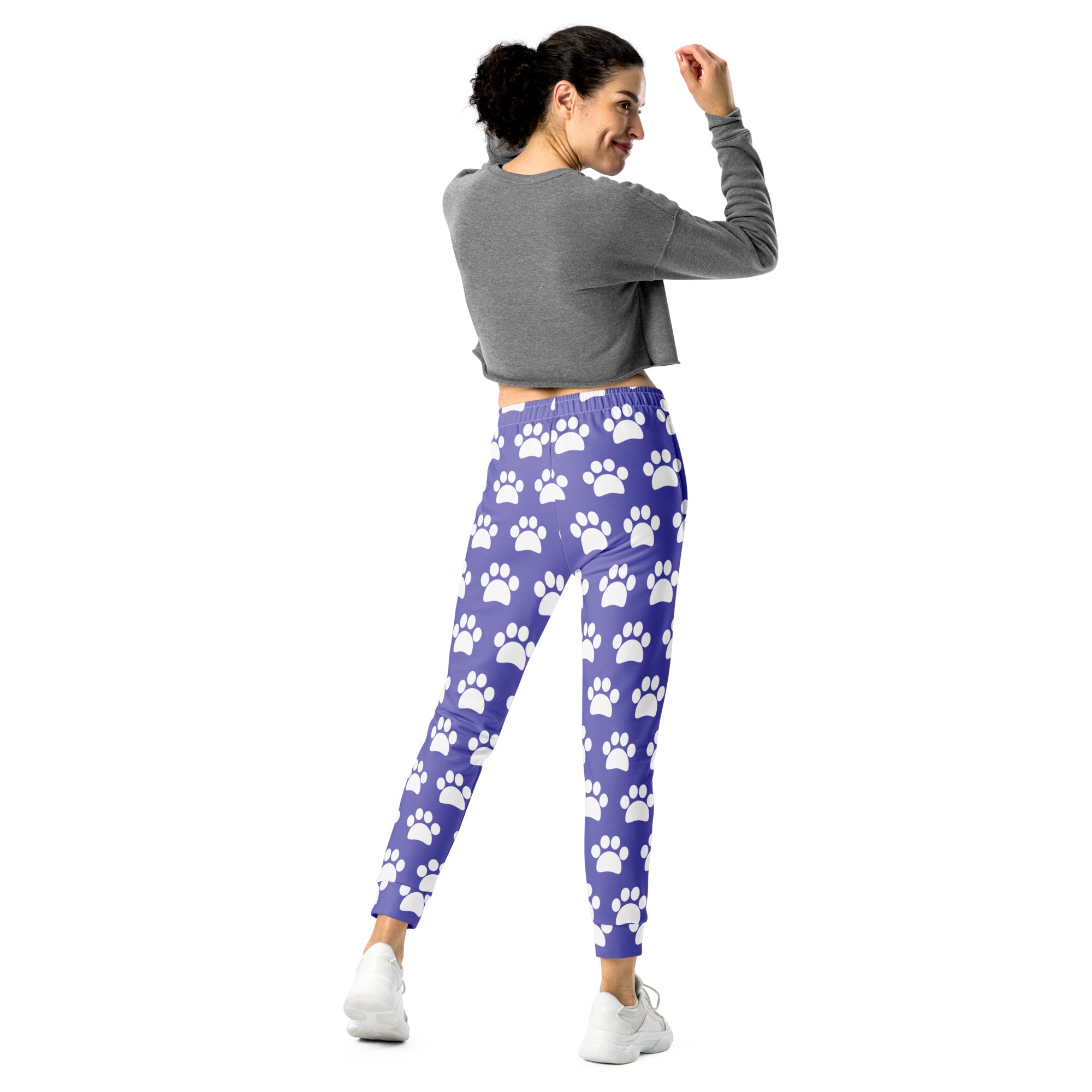 Women’s purple jogger pants with white paw print pattern cozy brushed inside fleece and pockets