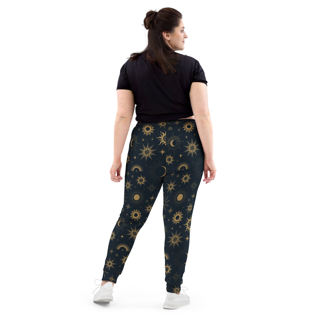 Dark green womens celestial sun and moon recycled jogger pants with vibrant gold pattern and cozy brushed fleece lining