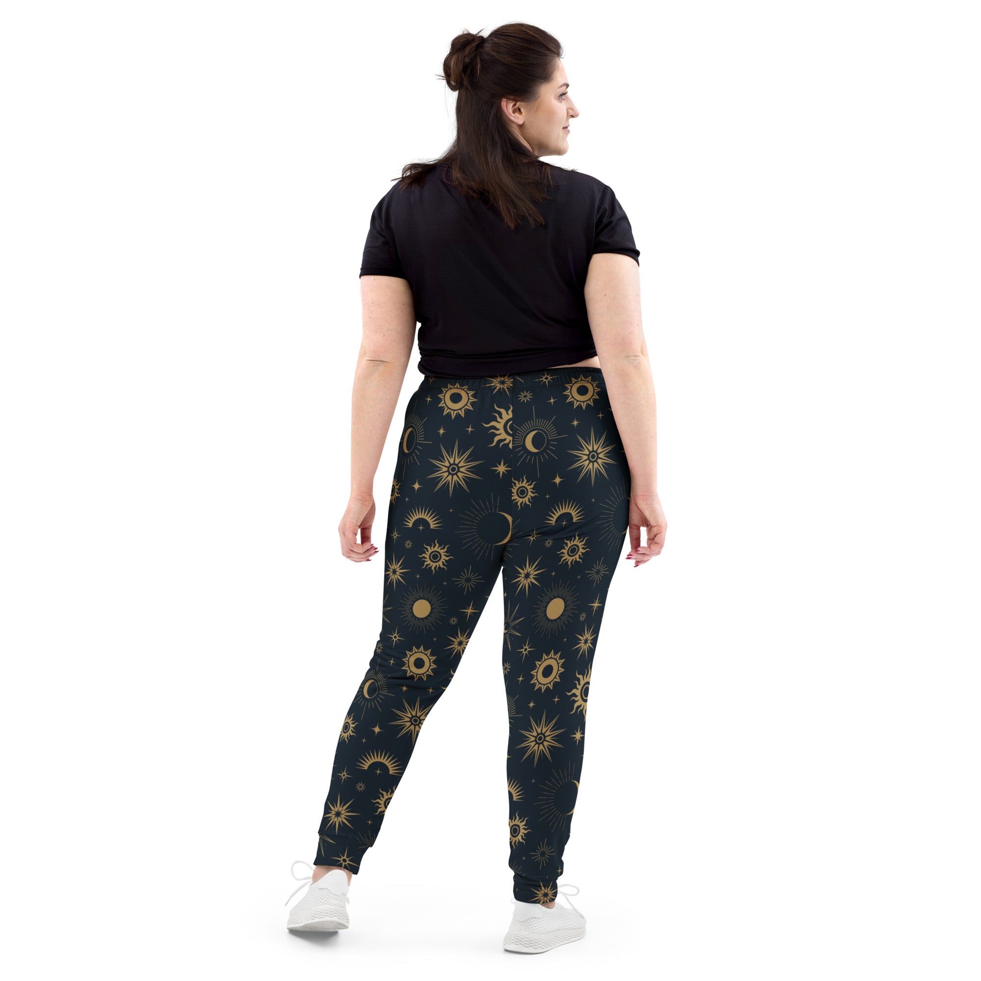 Dark green womens celestial sun and moon recycled jogger pants with vibrant gold pattern and cozy brushed fleece lining