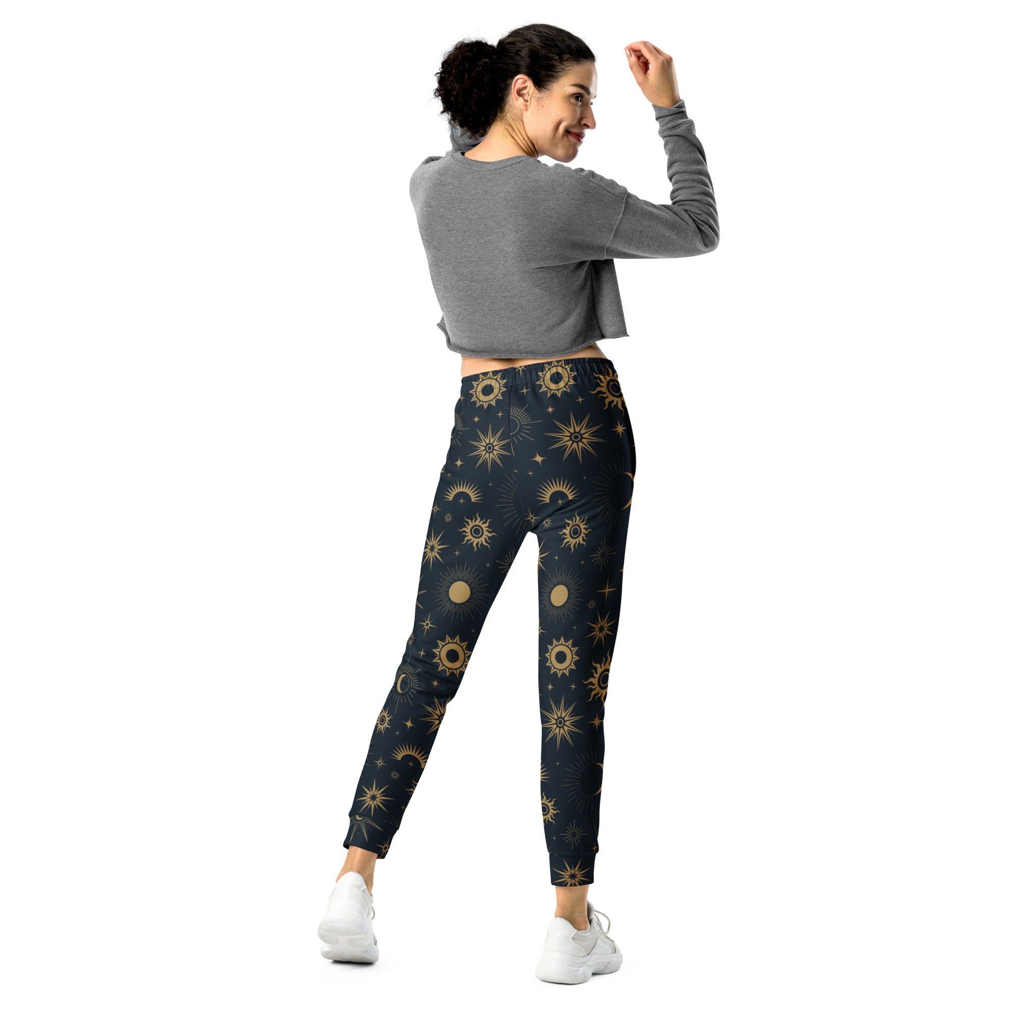 Dark blue women’s celestial sun and moon jogger pants with gold pattern cozy brushed fleece pockets