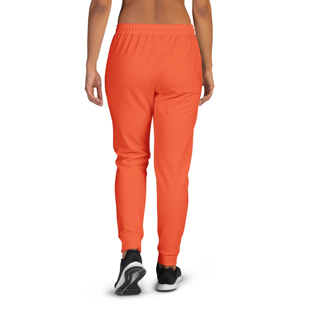 Women’s orange recycled jogger pants with elastic waistband ribbed cuffs cozy brushed inside fleece and pockets