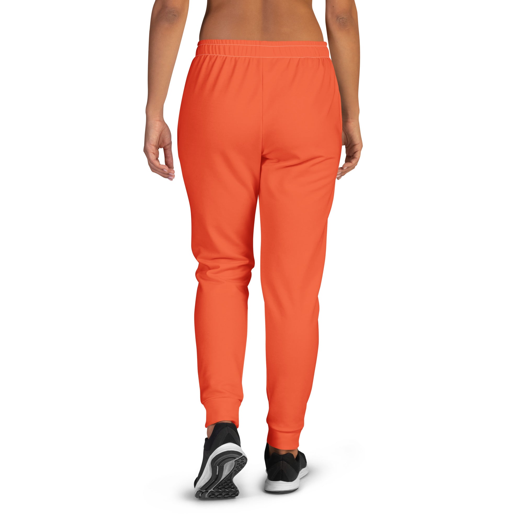 Women’s orange recycled jogger pants with elastic waistband ribbed cuffs cozy brushed inside fleece and pockets