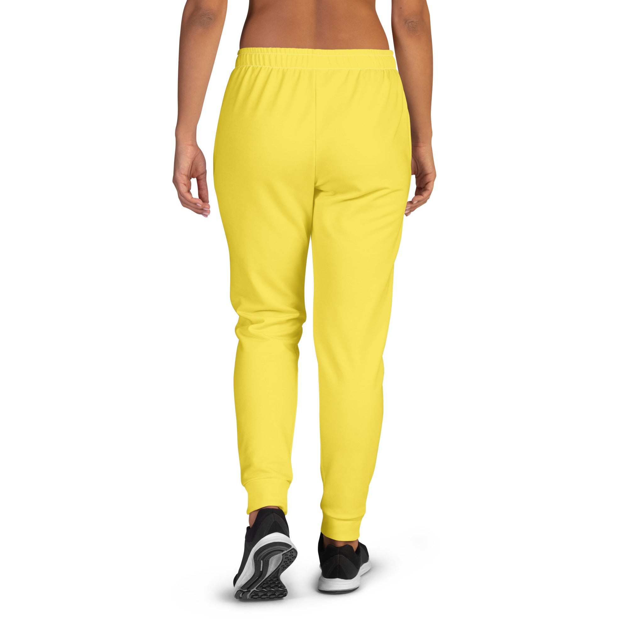 Women’s bright yellow recycled jogger pants with elastic waistband ribbed cuffs and cozy brushed inside fleece