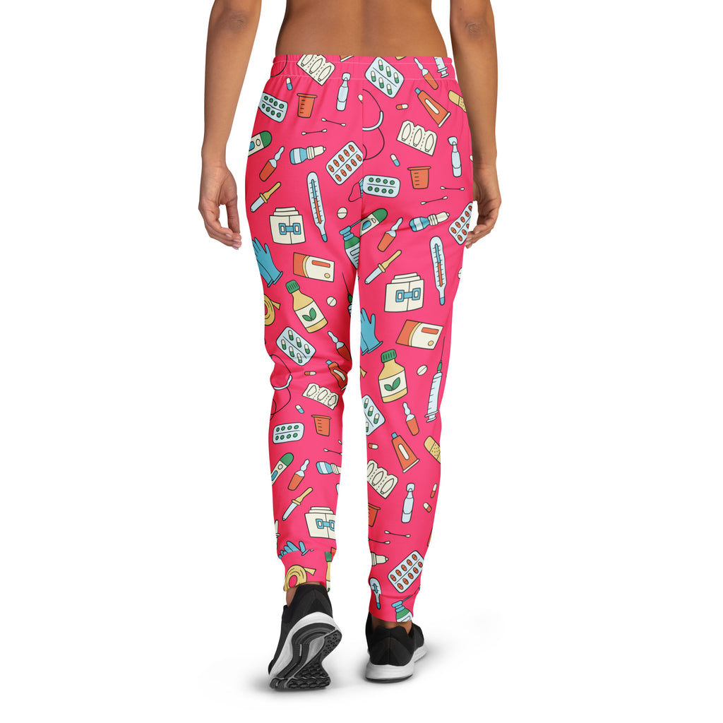 Women’s pink medical print recycled jogger pants with pockets featuring playful cartoon medical supplies pattern