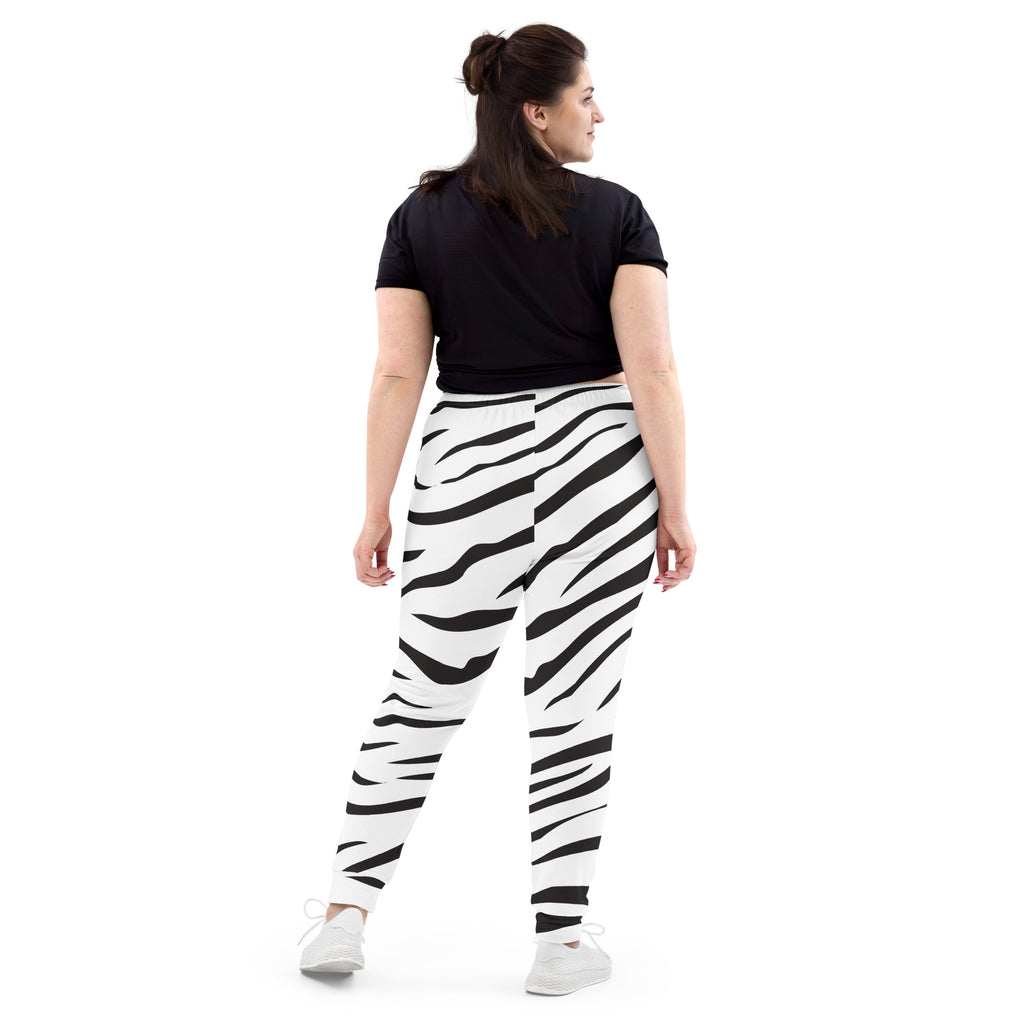 Women’s zebra print recycled jogger pants with pockets in black and white striped cozy brushed fleece interior