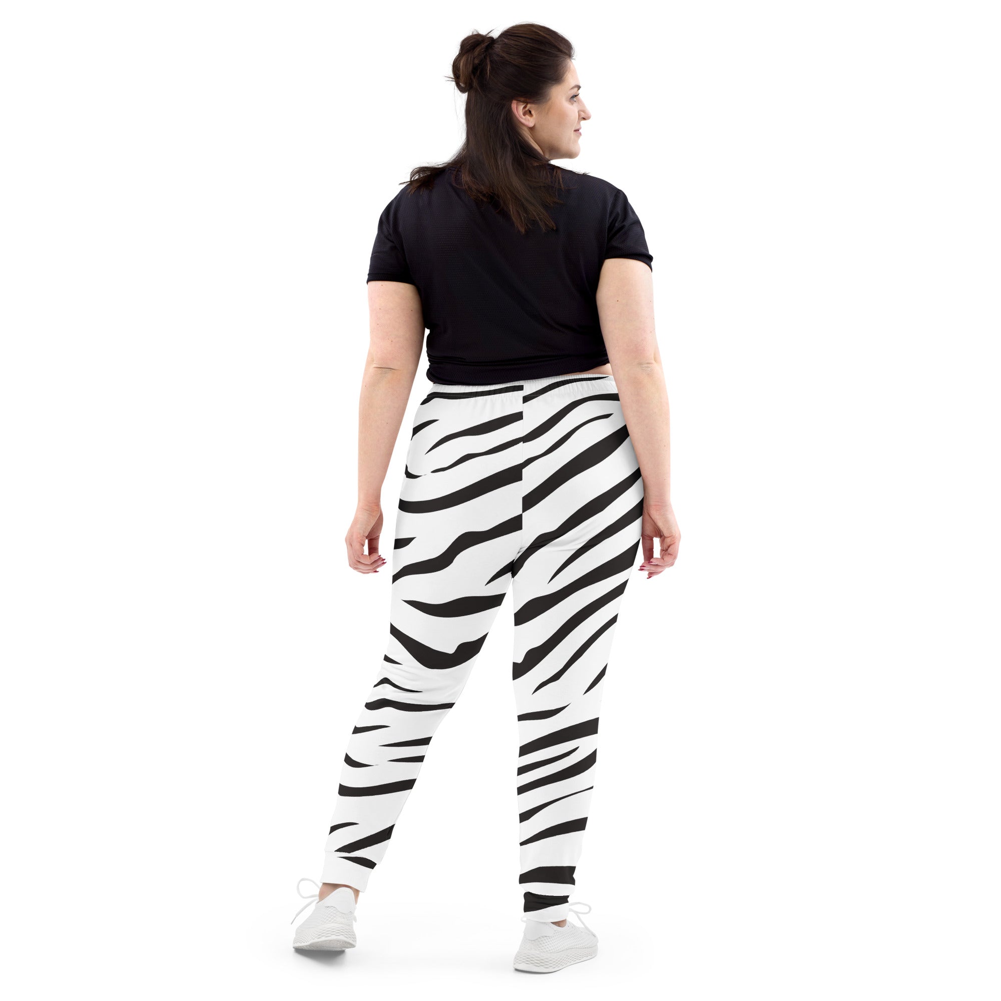 Women’s zebra print recycled jogger pants with pockets in black and white striped cozy brushed fleece interior