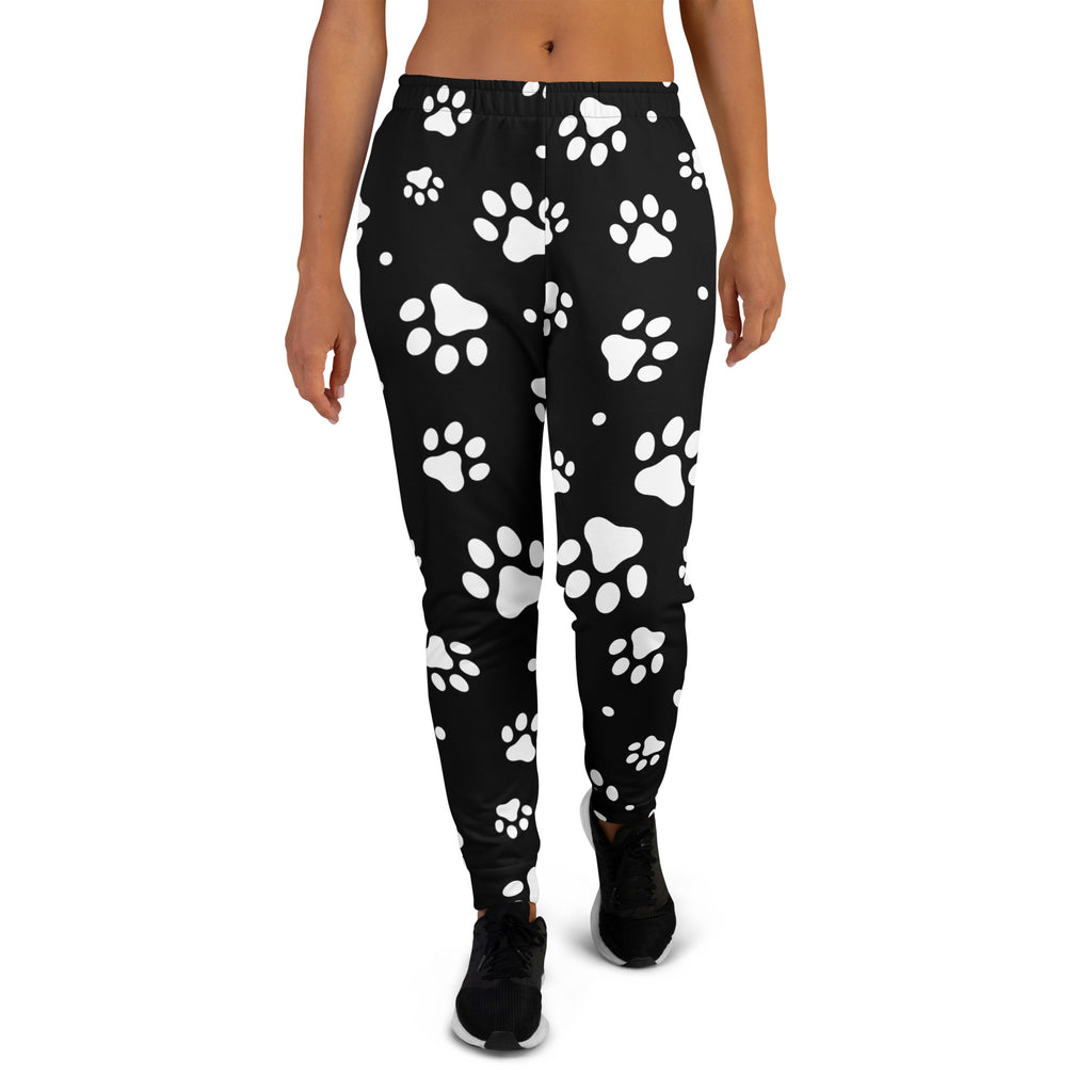Women’s black recycled jogger pants with white paw print pattern cozy brushed fleece inside and pockets