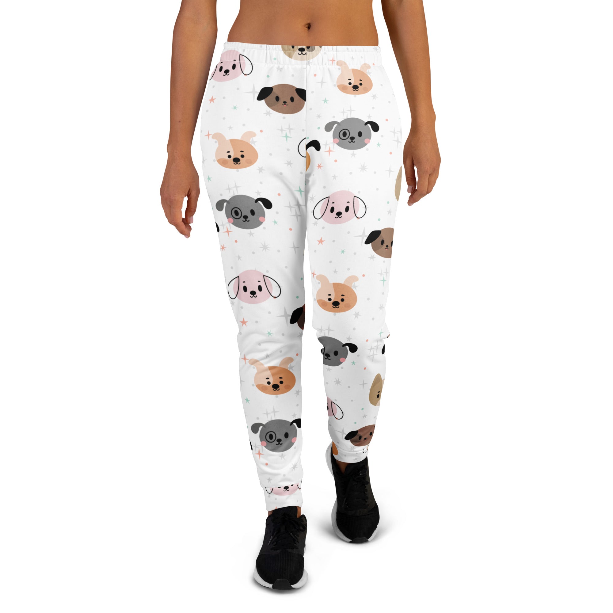 White women’s jogger pants with playful cartoon dog faces in pastel shades made of cozy recycled fleece with pockets
