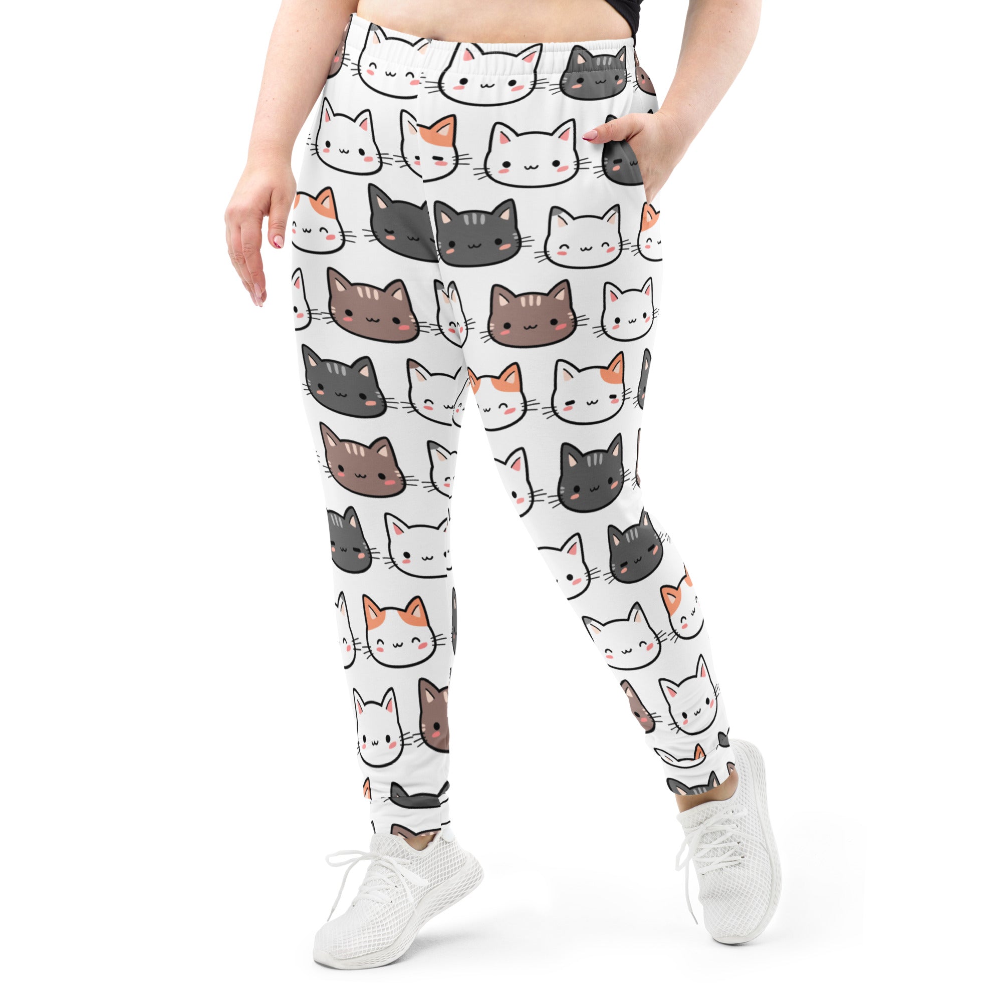 Women’s white recycled jogger pants with pockets featuring colorful cartoon cats and cozy brushed inside fleece lining