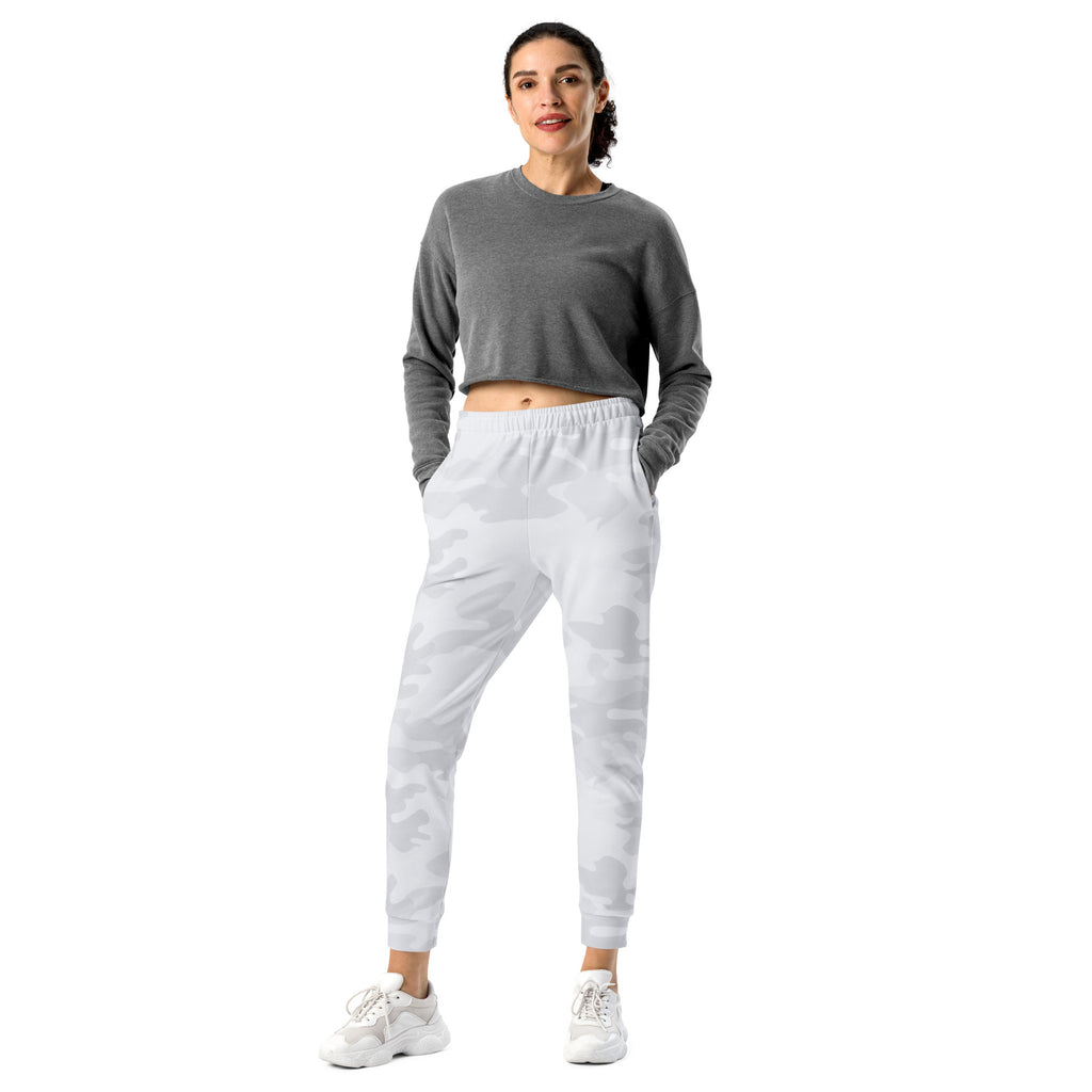 Women wearing gray camouflage recycled jogger pants with pockets and cozy brushed inside fleece paired with white sneakers