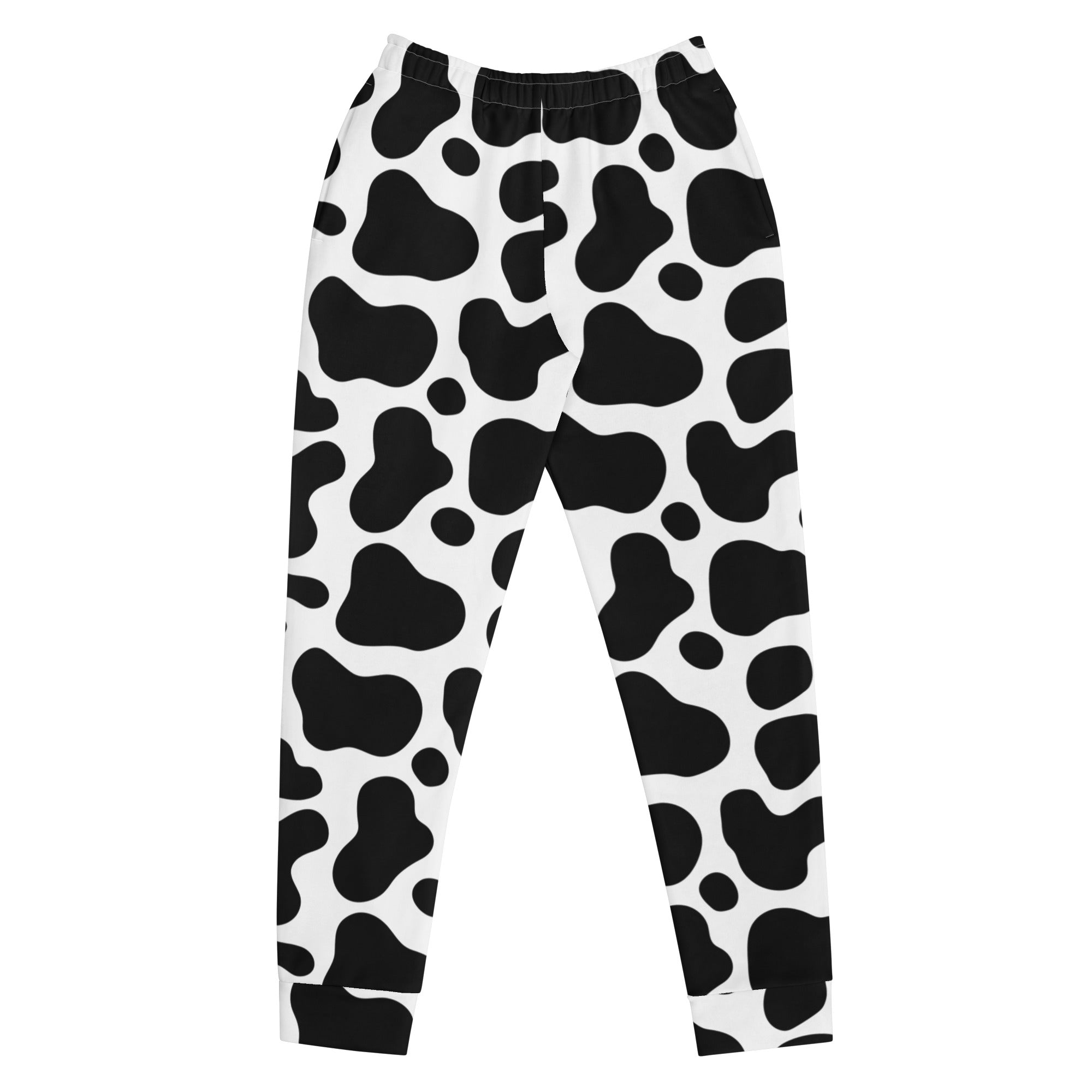 Women’s cow print recycled jogger pants with pockets featuring black and white cow print and a stretchy elastic waistband